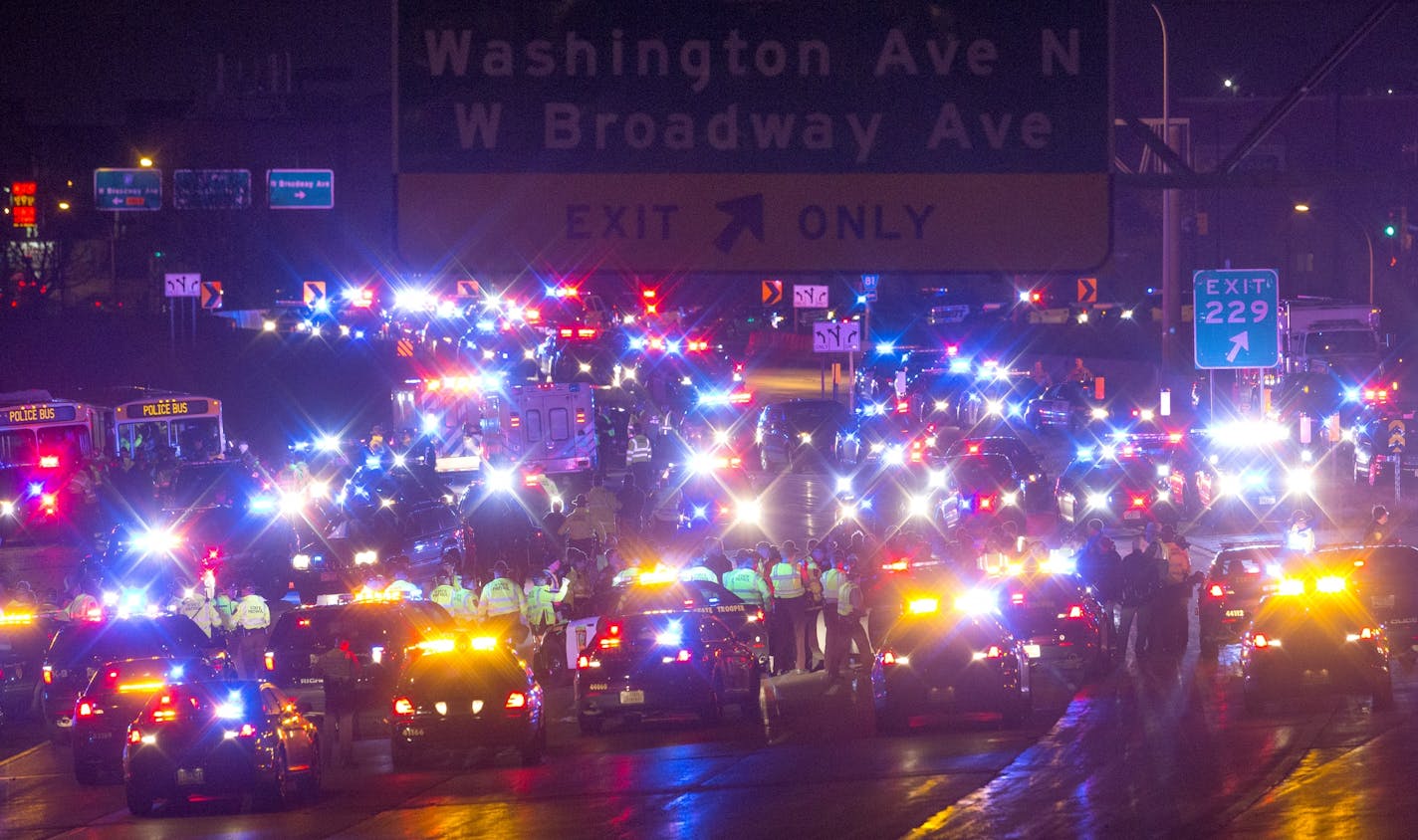 Black Lives Matter protesters were surrounded and arrested by police on I-94 in North Minneapolis on Monday night.