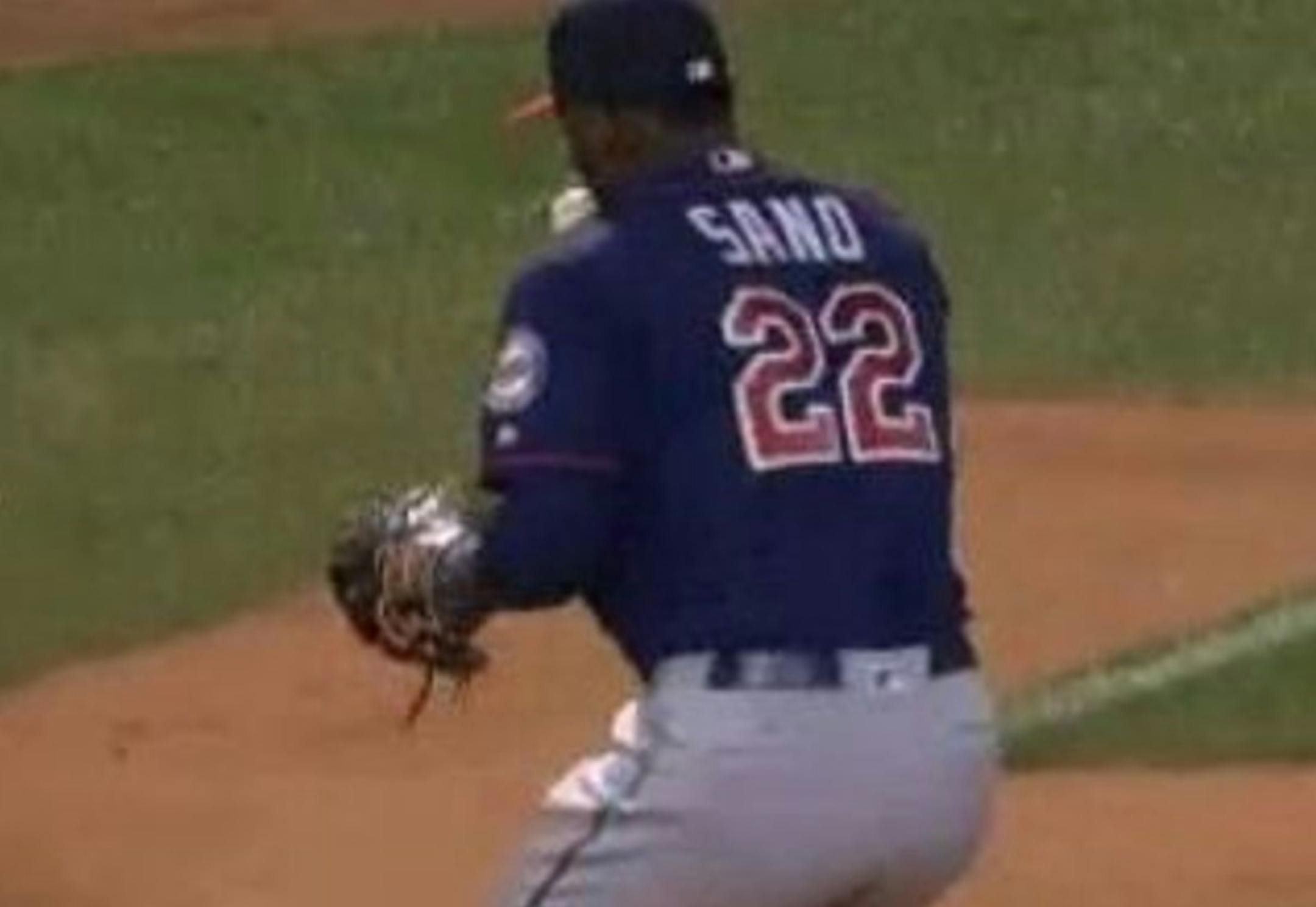Miguel Sano seals the Twins victory with a kiss Saturday night before throwing to first for the final out.