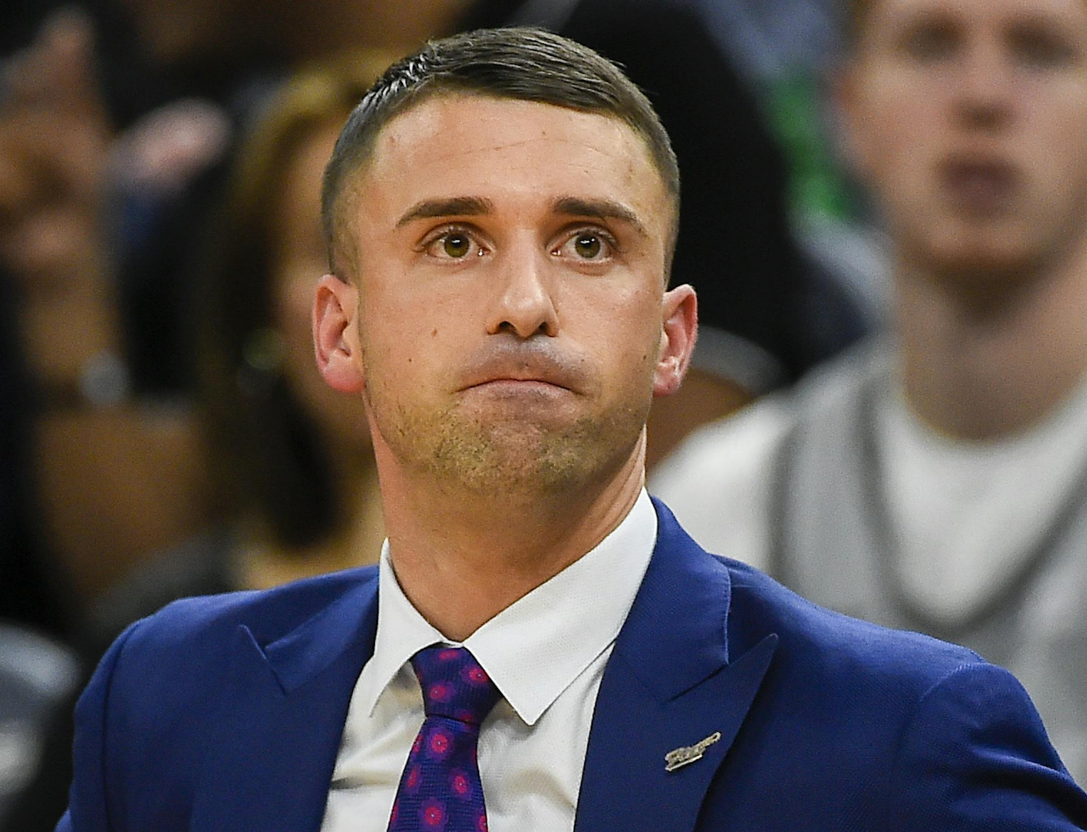 Minnesota Timberwolves coach Ryan Saunders watches the final minutes of the team's NBA basketball game against the New Orleans Pelicans on Wednesday, Dec. 18, 2019, in Minneapolis. The Pelicans won 107-99. (AP Photo/Craig Lassig)