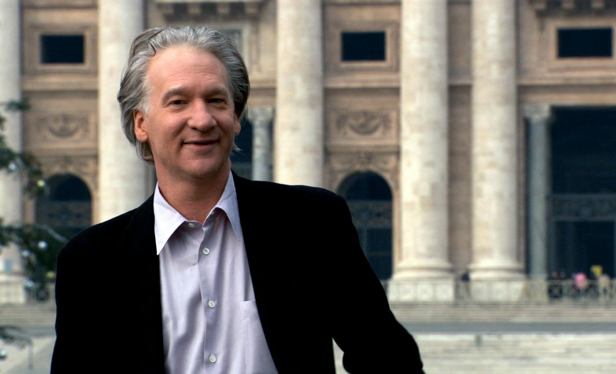 In this image released by Lionsgate pictures, Bill Maher stands outside the Vatican City in "Religulous."