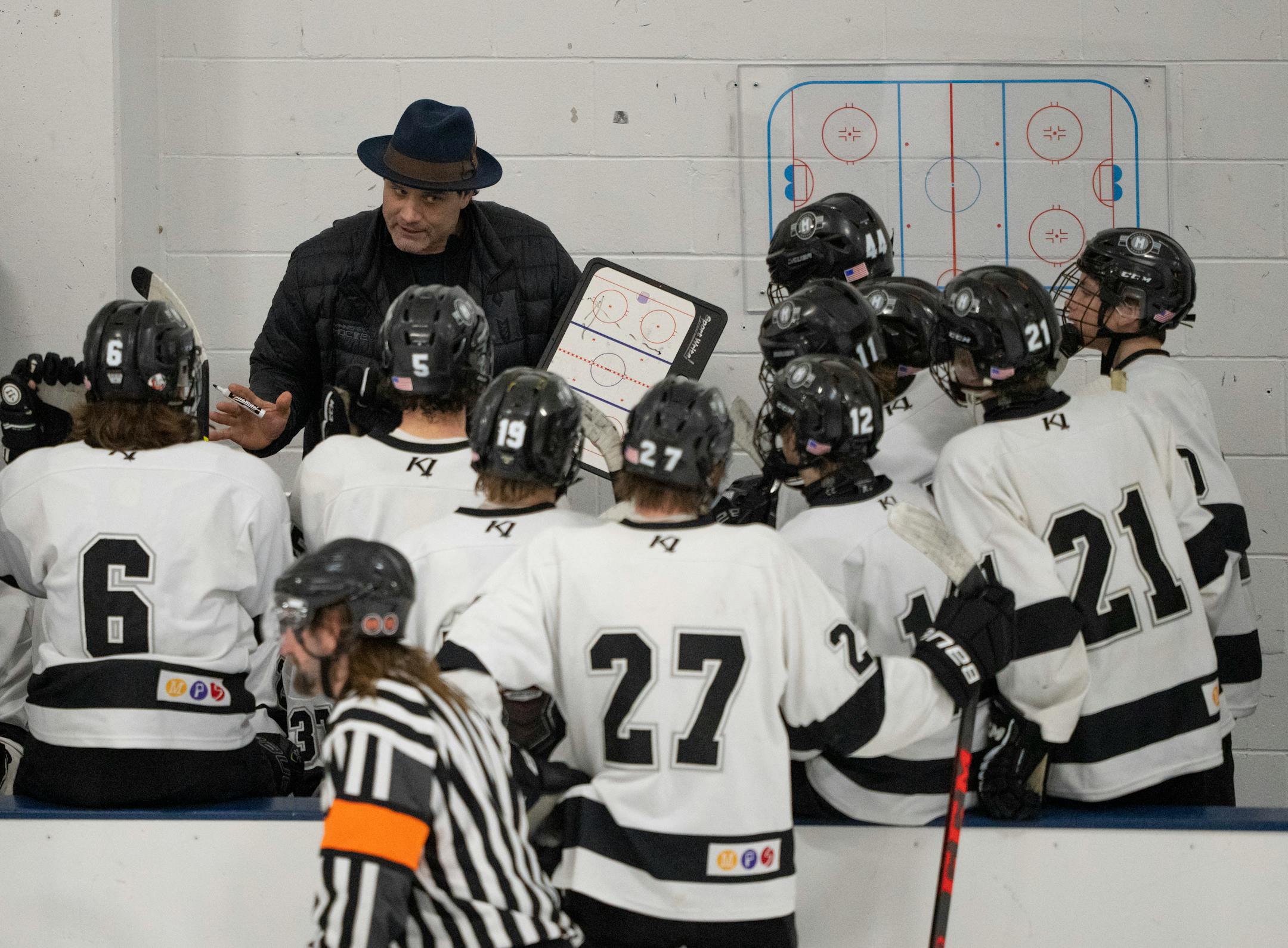 Minneapolis head coach Joe Dziedzic spoke to his team during a third period timeout. Minneapolis defeated Delano 3- to win the MSHSL Section 2A Boys Hockey Tournament Championship Wednesday night, March 2, 2022 at the St. Louis Park Rec Center and advance to the State Tournament. ] JEFF WHEELER • Jeff.Wheeler@startribune.com