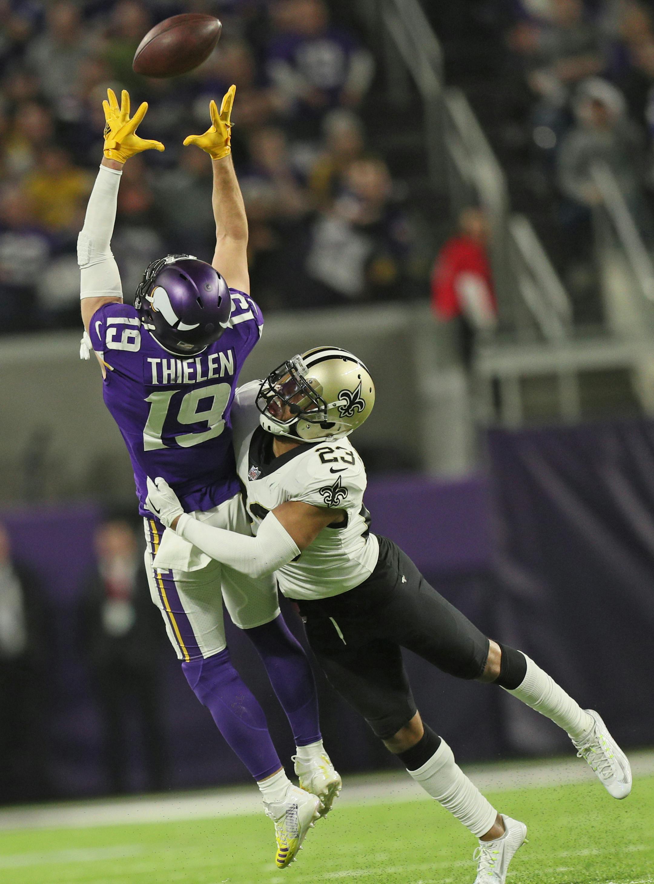 Vikings receiver Adam Thielen stretched high to make a reception against New Orleans Saints cornerback Marshon Lattimore. ] BRIAN PETERSON Ô brian.peterson@startribune.com The Minnesota Vikings faced the New Orleans Saints in an NFL divisional playoff game Sunday afternoon, January 14, 2018 at U.S. Bank Stadium in Minneapolis.