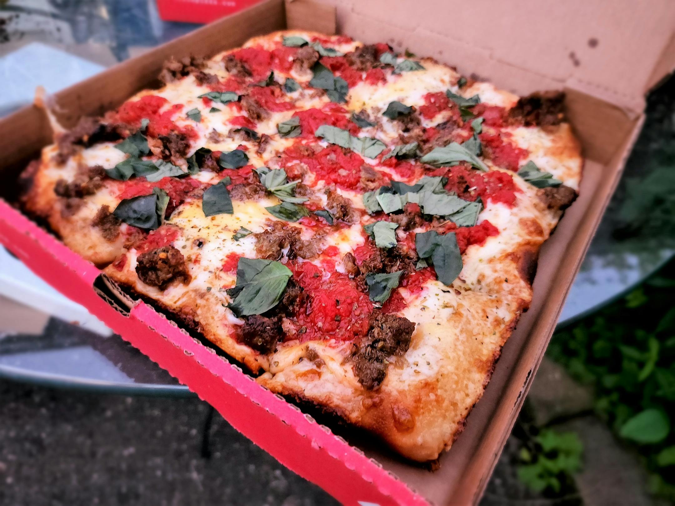 Sicilian pie with sausage from Hello Pizza