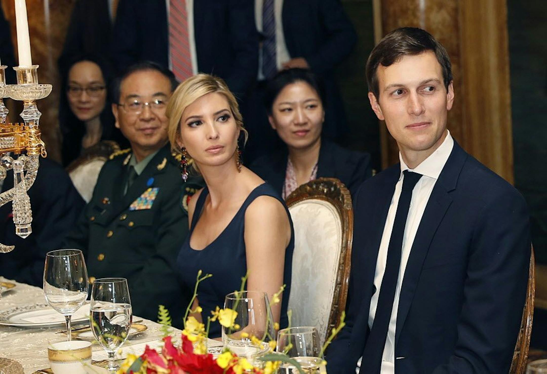 FILE - In this Thursday, April 6, 2017, file photo, Ivanka Trump, second from right, the daughter and assistant to President Donald Trump, is seated with her husband, White House senior adviser Jared Kushner, right, during a dinner with President Donald Trump and Chinese President Xi Jinping at Mar-a-Lago in Palm Beach, Fla. Earlier in the day, Ivanka Trump's company received provisional approval from the Chinese government for three new trademarks, winning monopoly rights to sell Ivanka brand j
