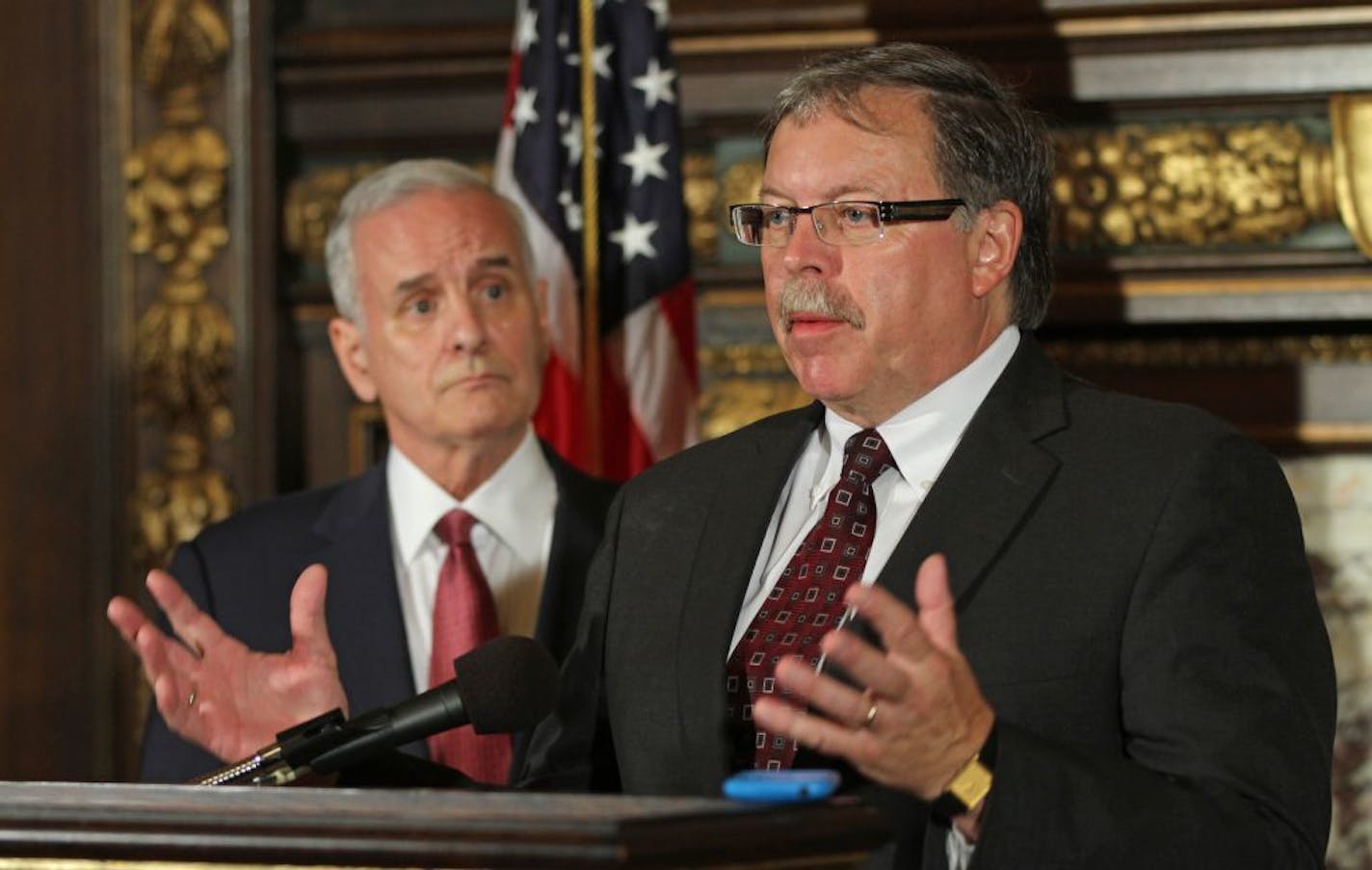 (left to right) Minnesota Governor Mark Dayton and DEED Commissioner Mark Phillips described the process of the selection of development grants that will fund 9 projects statewide including a new Saints Stadium, during a press conference on 9/13/12.