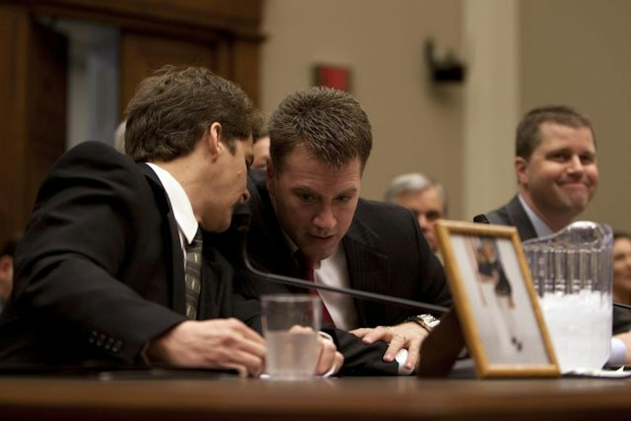 Jeff Almer, left, Lou Tousignant, center, and Peter K. Hurley of Wilsonville, Ore., whose family members were killed or sickened by salmonella, called on Congress to approve mandatory product recalls.