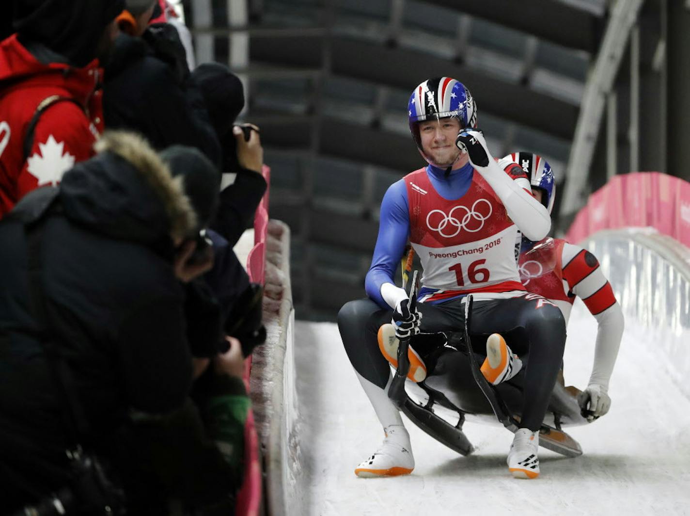 Justin Krewson and Andrew Sherk of the United States react after their final run during the men's doubles luge final at the 2018 Winter Olympics in Pyeongchang, South Korea, Wednesday, Feb. 14, 2018. (AP Photo/Andy Wong)