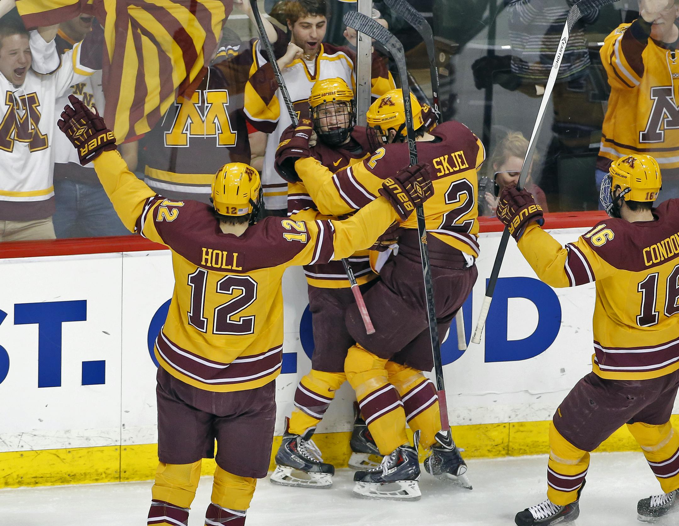 Gophers players and fans celebrated an early goal by Justin Kloos in the first period Sunday in an NCAA tournament game at Xcel Energy Center.
