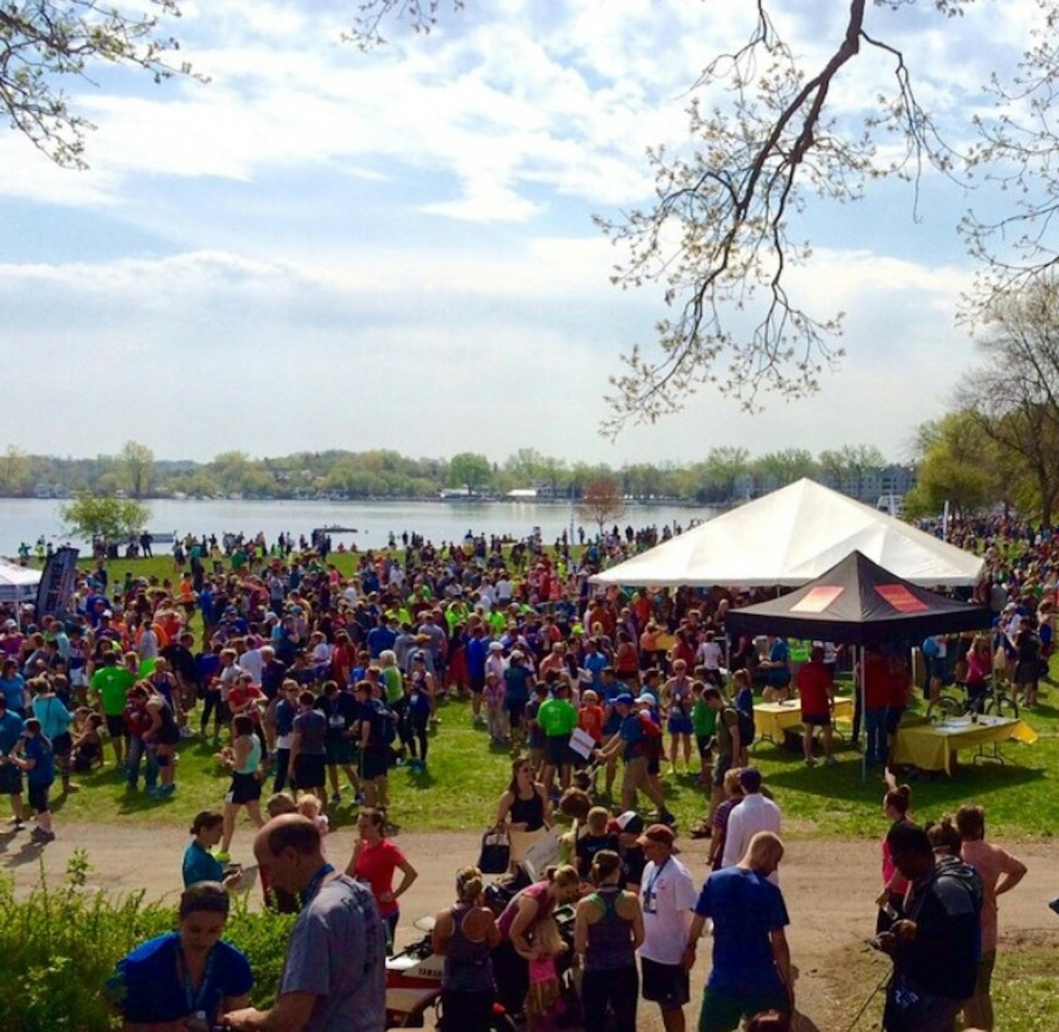Runners fill The Commons, Excelsior's lakeside park after the Lake Minnetonka Half Marathon in 2015, one of the many annual events Excelsior hosts throughout the year.