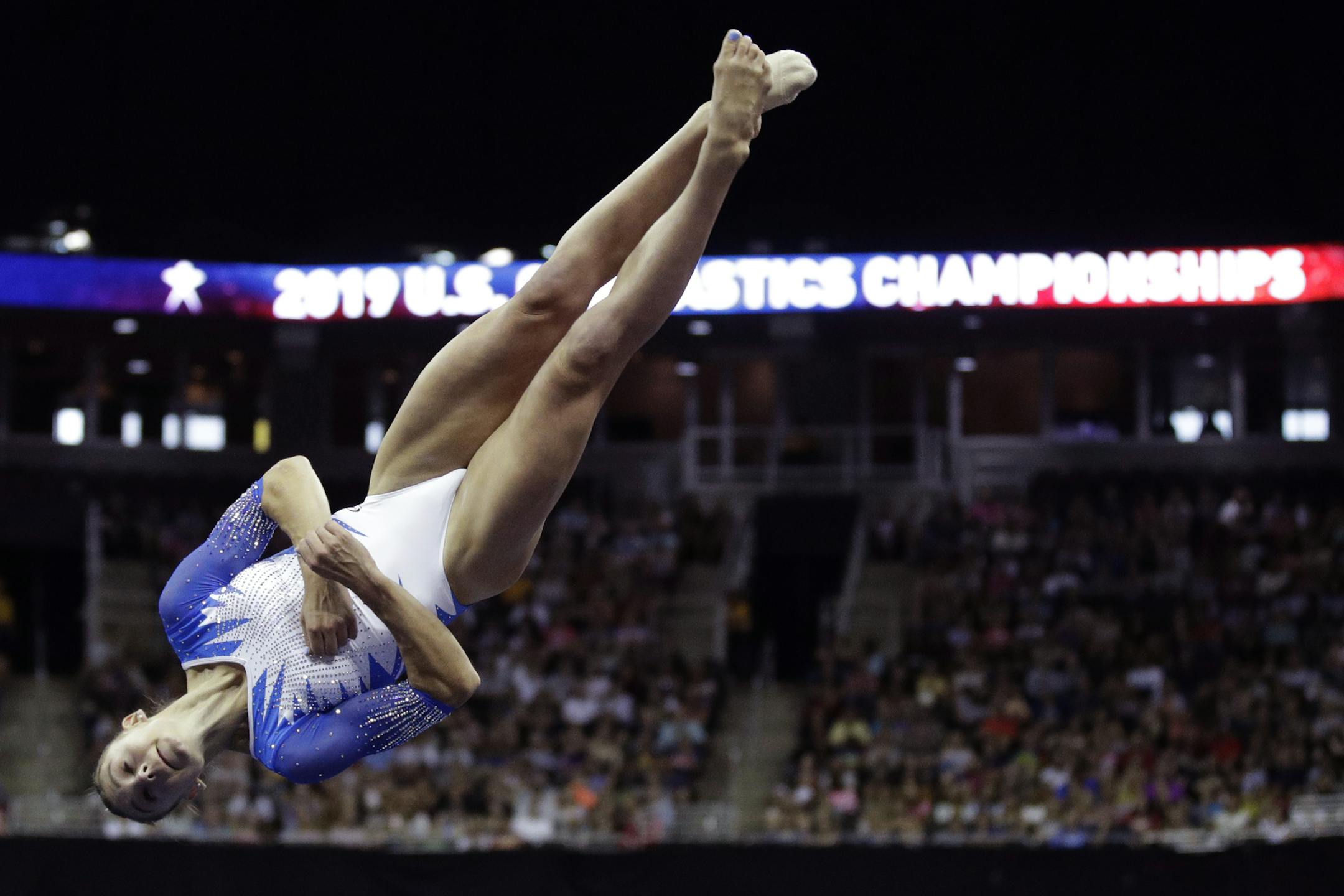 Grace McCallum competes in the floor exercise during the senior women's competition at the 2019 U.S. Gymnastics Championships Sunday, Aug. 11, 2019, in Kansas City, Mo. McCallum finished third in the all-around. (AP Photo/Charlie Riedel)