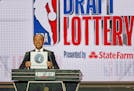 NBA Deputy Commissioner Mark Tatum announces that the Minnesota Timberwolves had won the eleventh pick during the NBA draft lottery in 2019. The Wolve