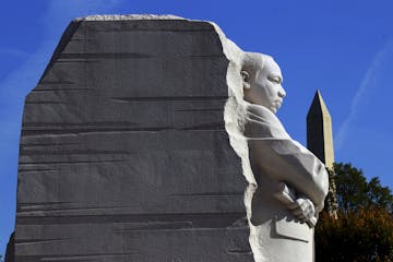 The monument at the Martin Luther King Jr. Memorial dedication, with the Washington Monument in the background, on the National Mall in Washington, Oc