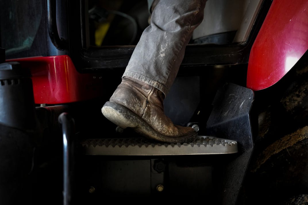 Ben Johnson prepares his tractor befor pulling his combine from the mud after it got stuck while moving to a different field during the 2025 harvest.
Wednesday October 22, 2025