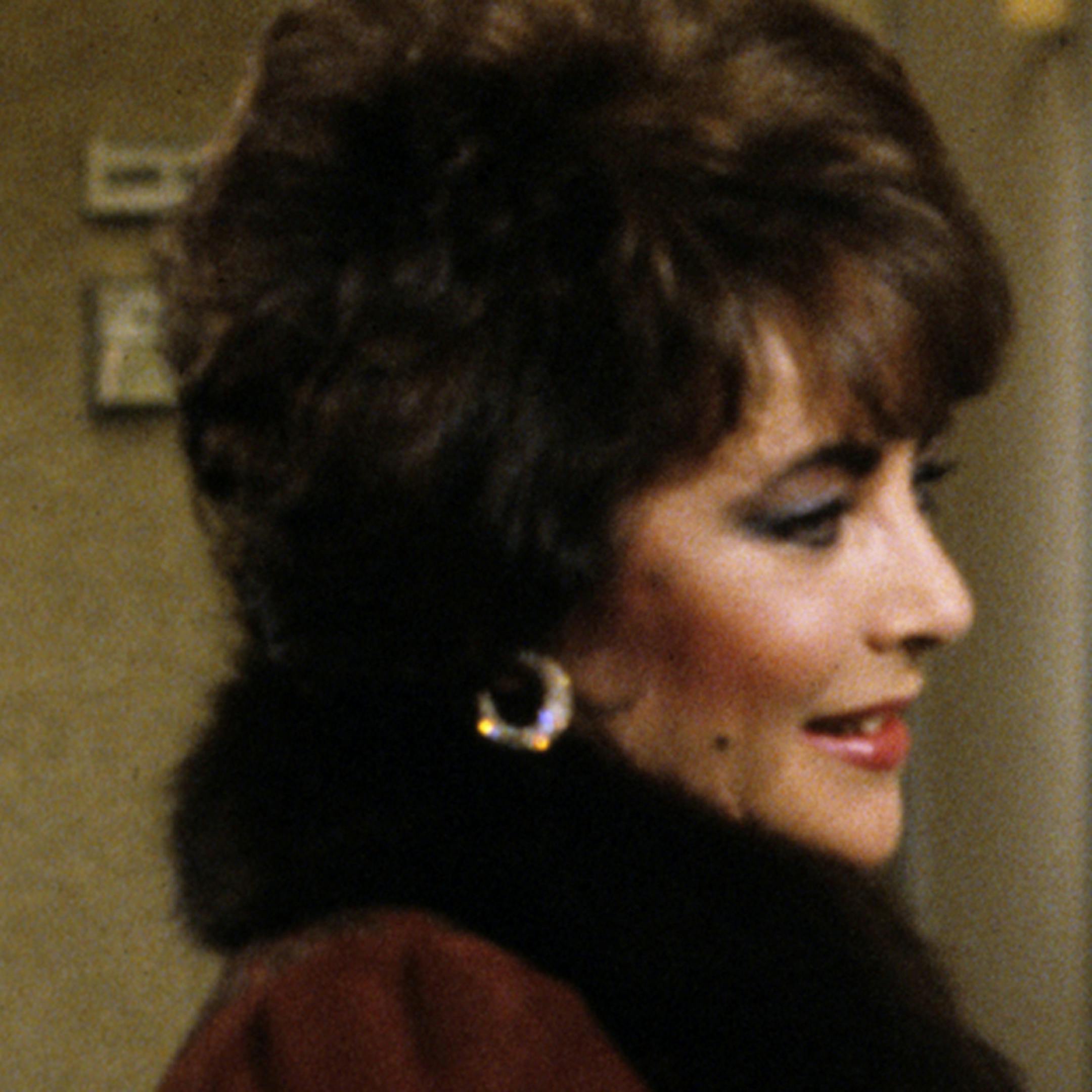 In this 1981 photo provided by ABC, Elizabeth Taylor, portraying Helena Cassadine, left, and Rick Springfield, portraying Dr. Noah Drake, center, are shown on the set of the ABC daytime series, "General Hospital" with Executive Producer/Director Gloria Monty. It's been 45 years since "General Hospital" began dispensing heavy doses of drama to TV viewers. Since 1963, ABC's longest-running daytime series has documented the trials and tribulations of Port Charles' citizens, carving an unprecedented