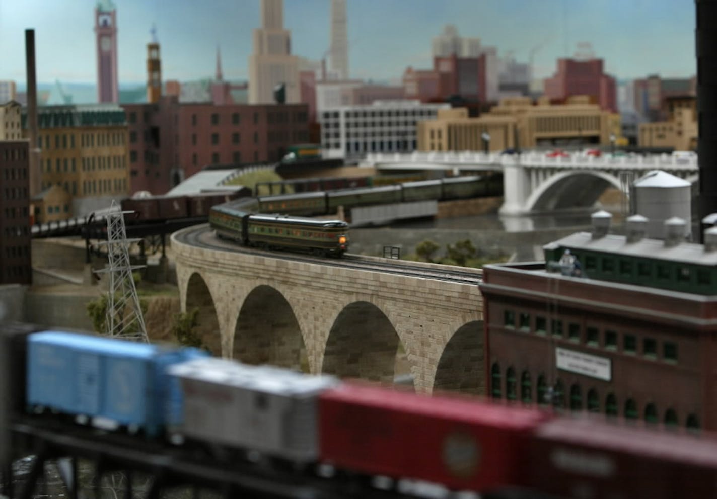 File photo by Tom Sweeney: The Twin City Model Railroad Museum moving out of Bandana Square featured a scale model of the Minneapolis riverfront skyline, with a Northern Pacific passenger train heading across the Stone Arch Bridge.