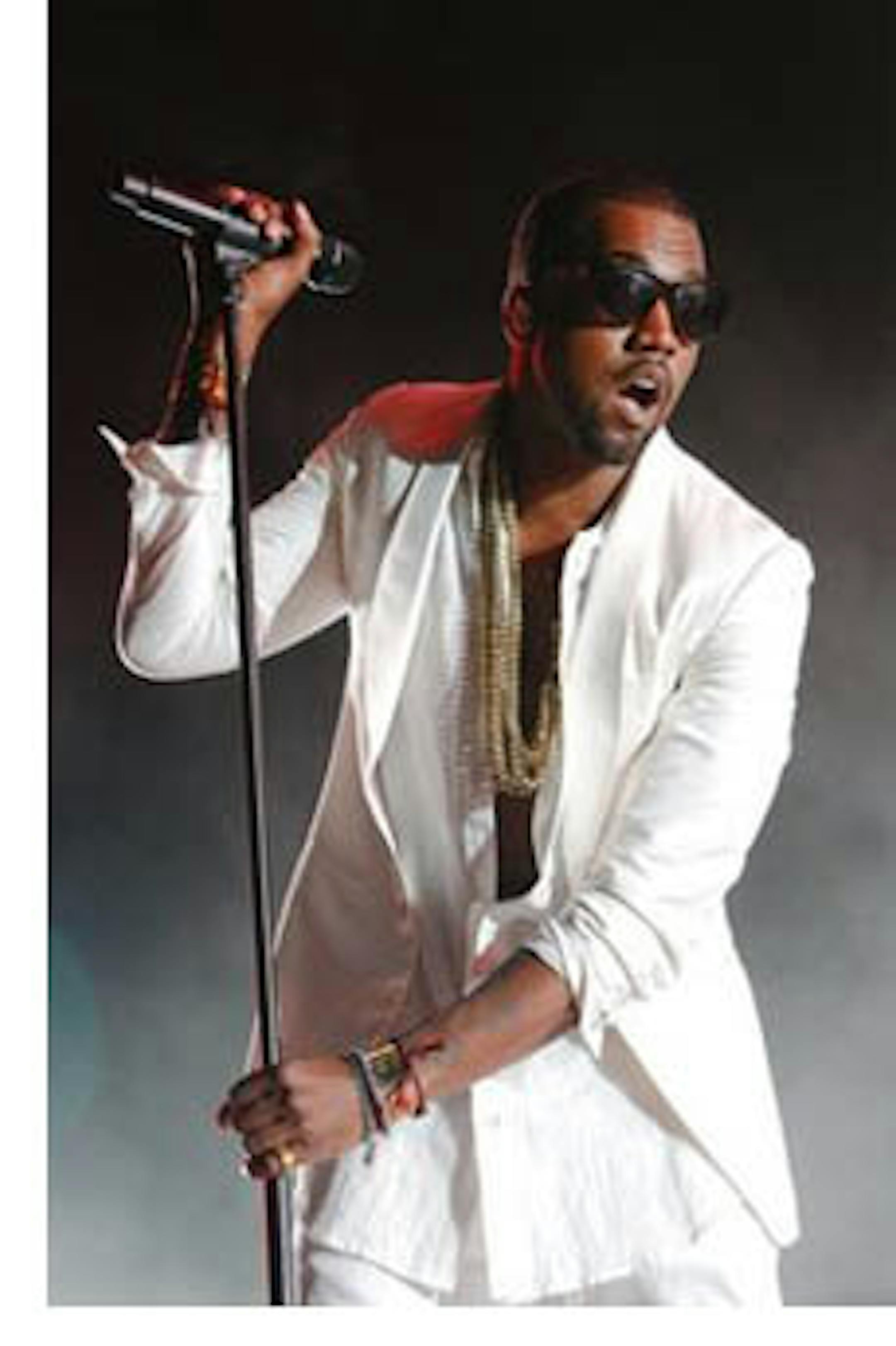 In this May 21, 2011 photo, U.S. singer and rapper Kanye West performs at Mawazine Festival in Rabat, Morocco. West is headlining the second night of the Big Chill Music Festival in Eastnor Castle Deer Park, England, Saturday, Aug. 6, 2011. (AP Photo/Abdeljalil Bounhar)