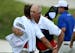Tom Lehman hugged his caddie after shoot a 4-under 67 in the first round of the 3M Open at TPC Twin Cities in Blaine. ] AARON LAVINSKY• aaron.lavins