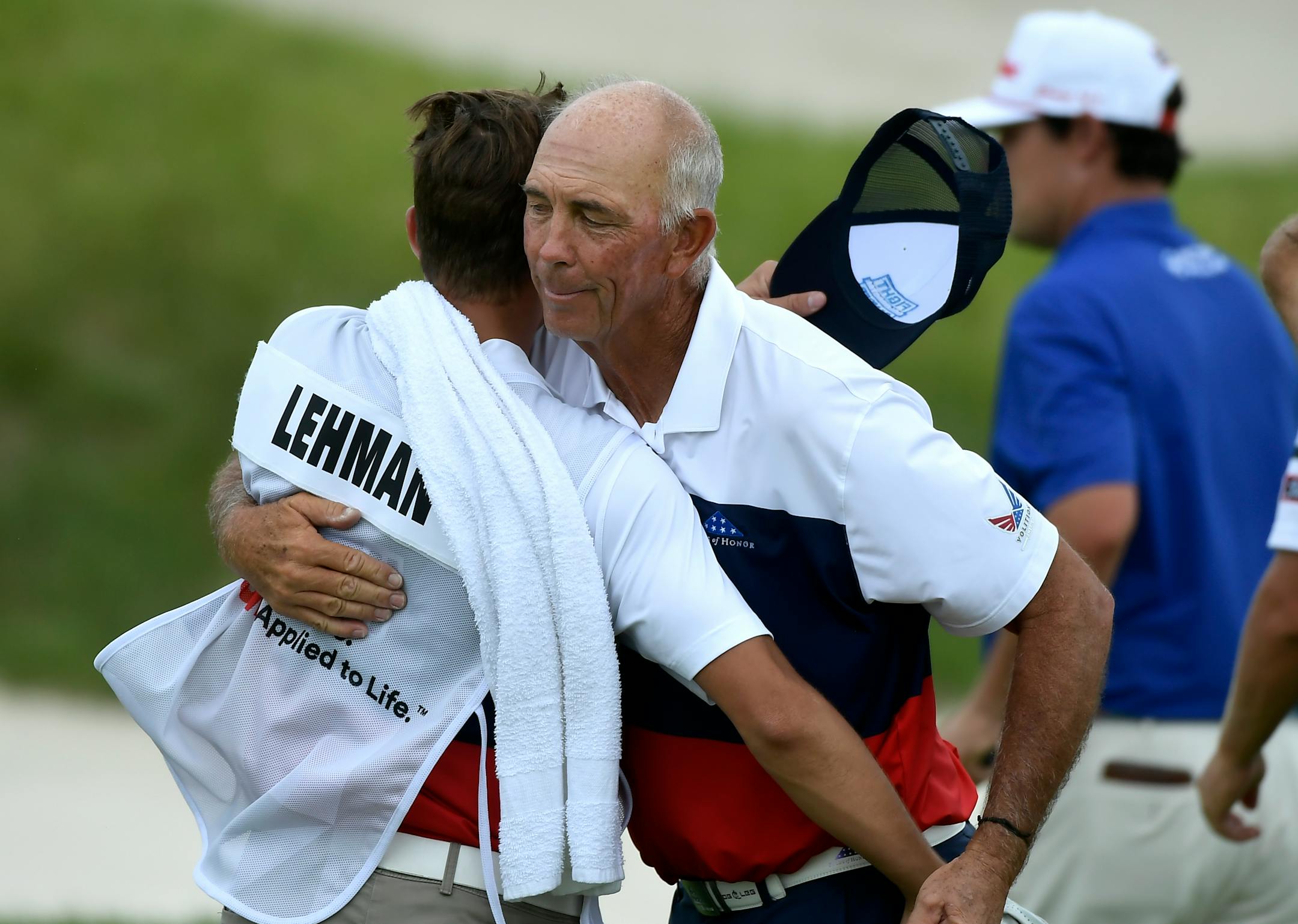 Tom Lehman hugged his caddie after shoot a 4-under 67 in the first round of the 3M Open at TPC Twin Cities in Blaine. ] AARON LAVINSKY• aaron.lavinsky@startribune.com