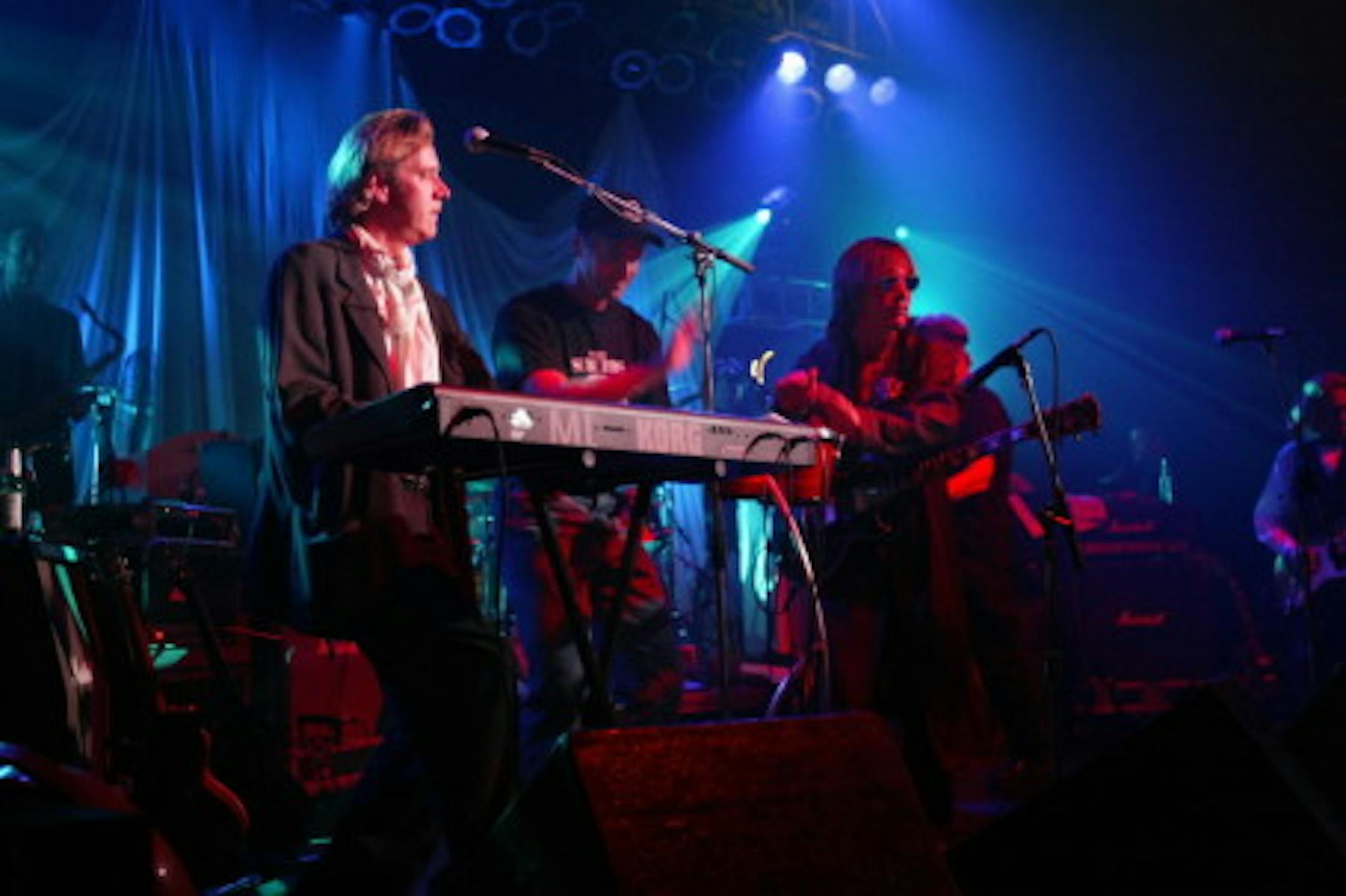Chan Polin, Beej Chaney and some unknown bongo player during a Suburbs gig at First Ave in 2006 / By Tom Sweeney