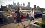 After drinks on the rooftop with friends who live in the A-Mill Lofts, Maryrose Dolezal and Roya Moltaji, right, danced with each other when "their" s