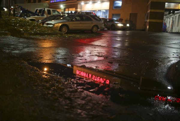 The scene in Minneapolis where Abdirahman H. Haji-Ahmed was found dead in his parked car in 2013.