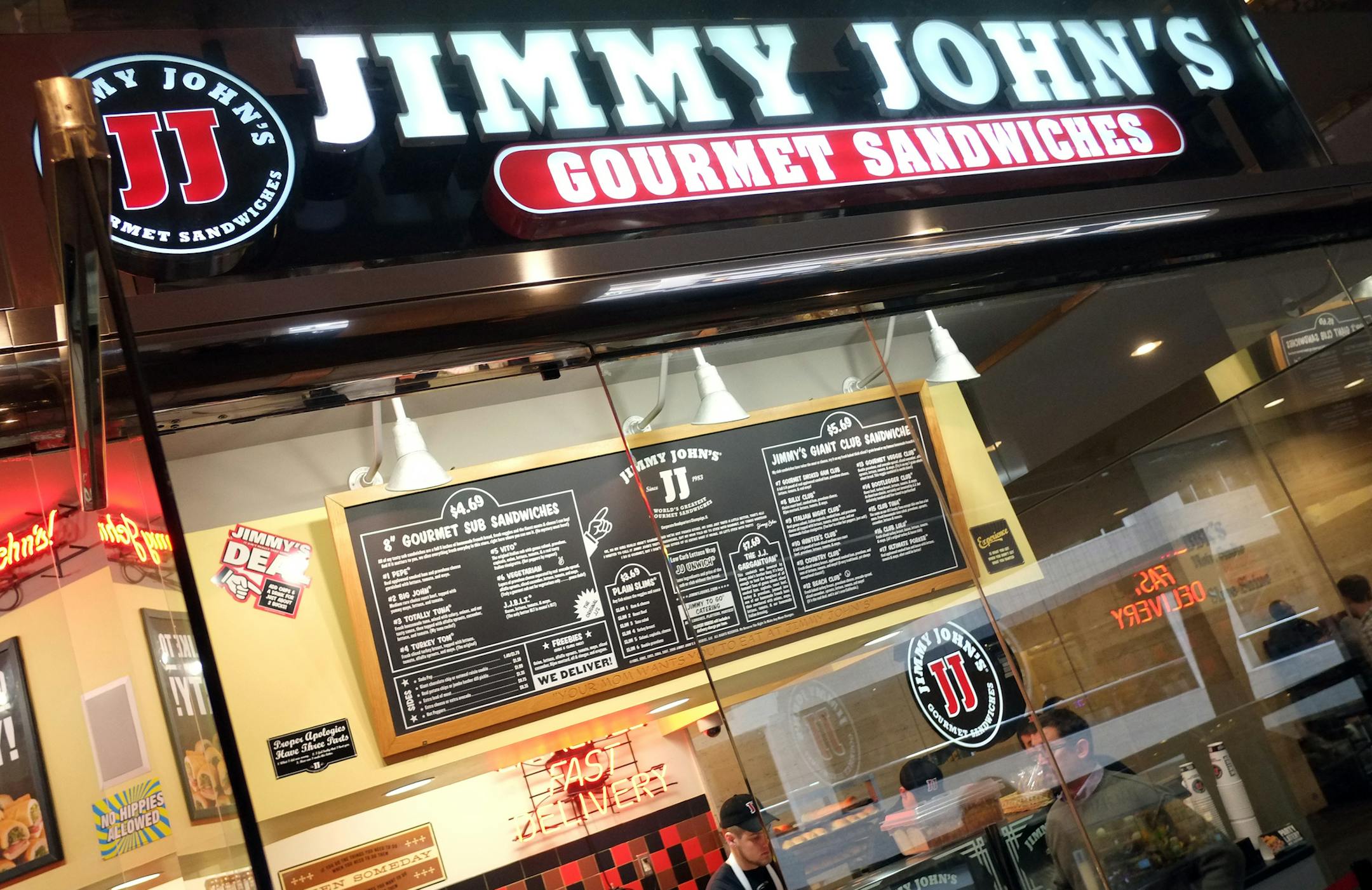 Jimmy John's Signage. ] TOM WALLACE • twallace@startribune.com _ Assignments #20027783A_ February 23, 2013_ SLUG: 355643 RN022813_ EXTRA INFORMATION: Minneapolis eats, with a variety of food, settings, and people using the skyway eateries to get them through the lunch hours. People: Jeff Burstein, owner of the classic Brothers Deli, 6th and Nicollet Places: One Two Three Sushi in the IDS Center (7th St. side), where they have a design-your-own sushi line. food: a stack of the beautiful "O