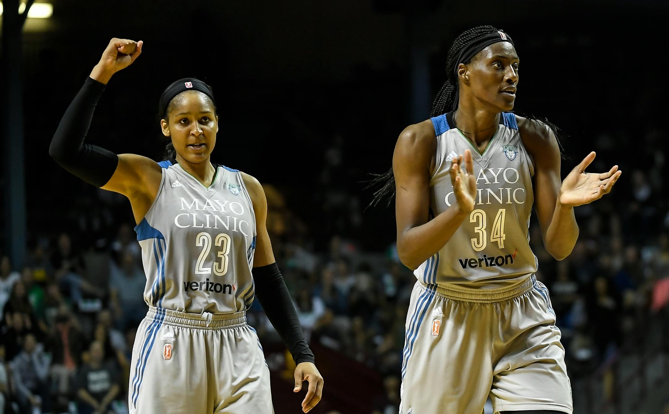 Minnesota Lynx forward Maya Moore (23) and Minnesota Lynx center Sylvia Fowles (34) celebrated after forcing a Mystics timeout in the third quarter Tuesday night.