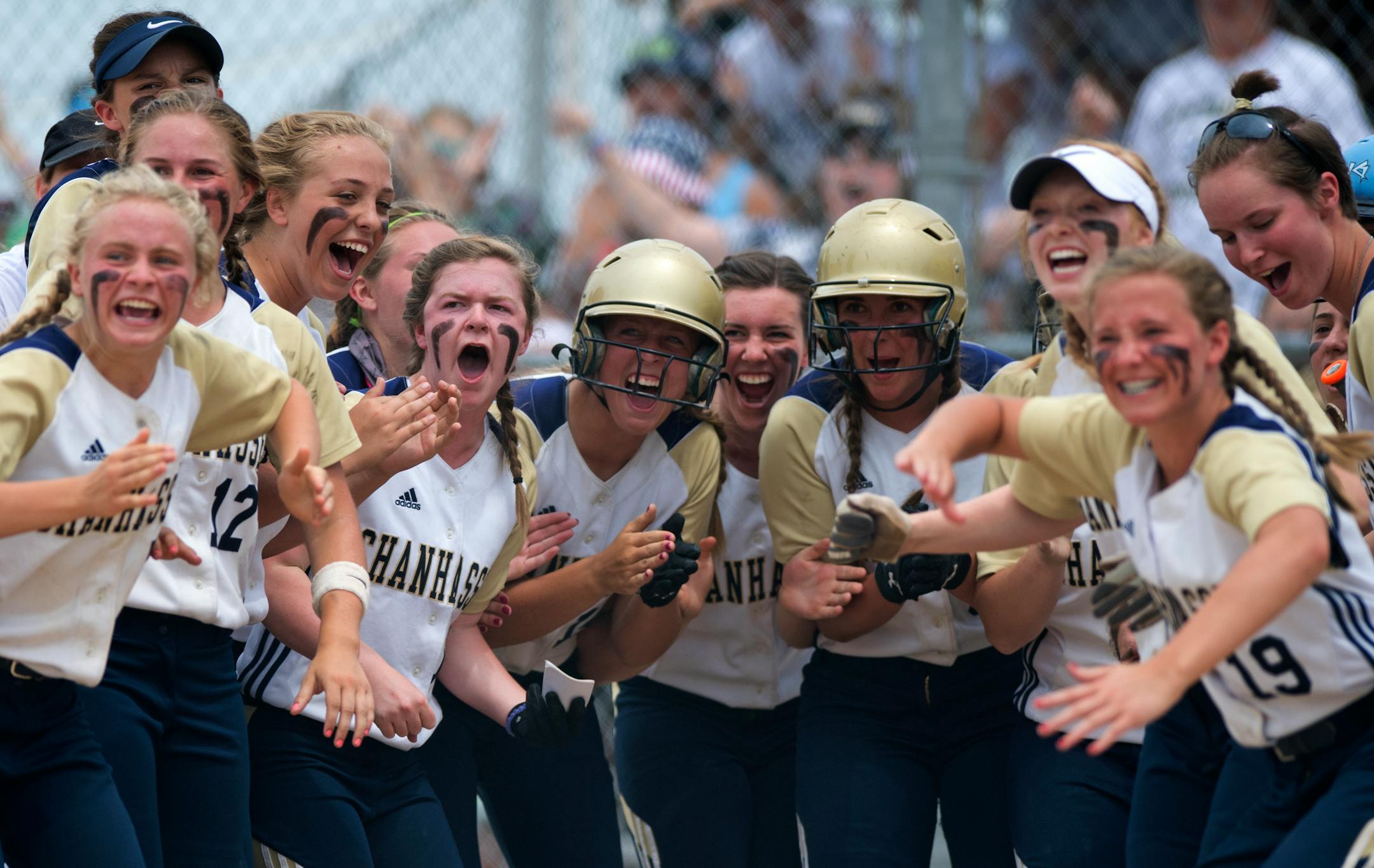 Chanhassen players cheer during the state softball championship game last spring.