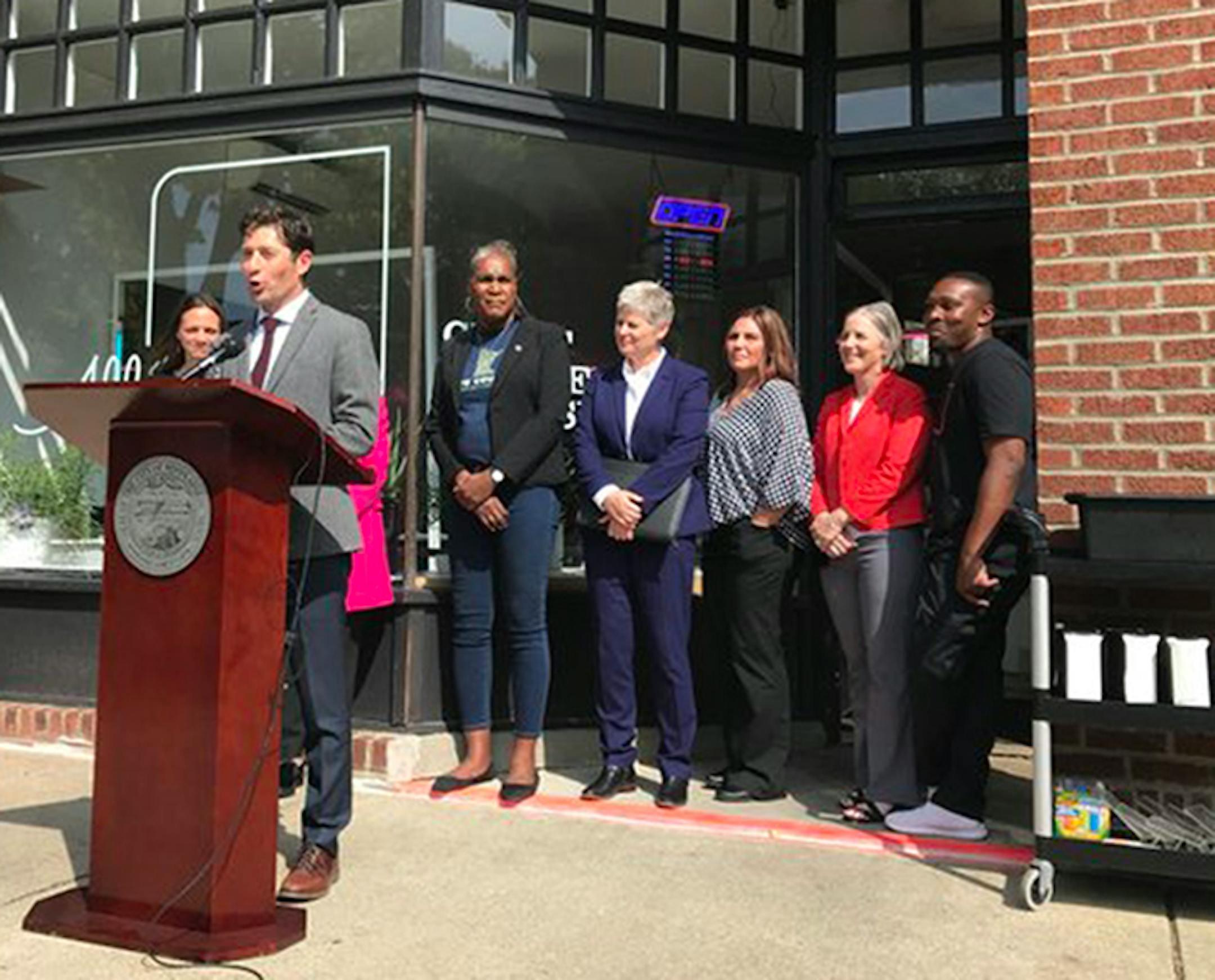 Mayor Jacob Frey and other city and Hennepin County outlined the bail alternative program Wednesday outside All Square in Minneapolis.