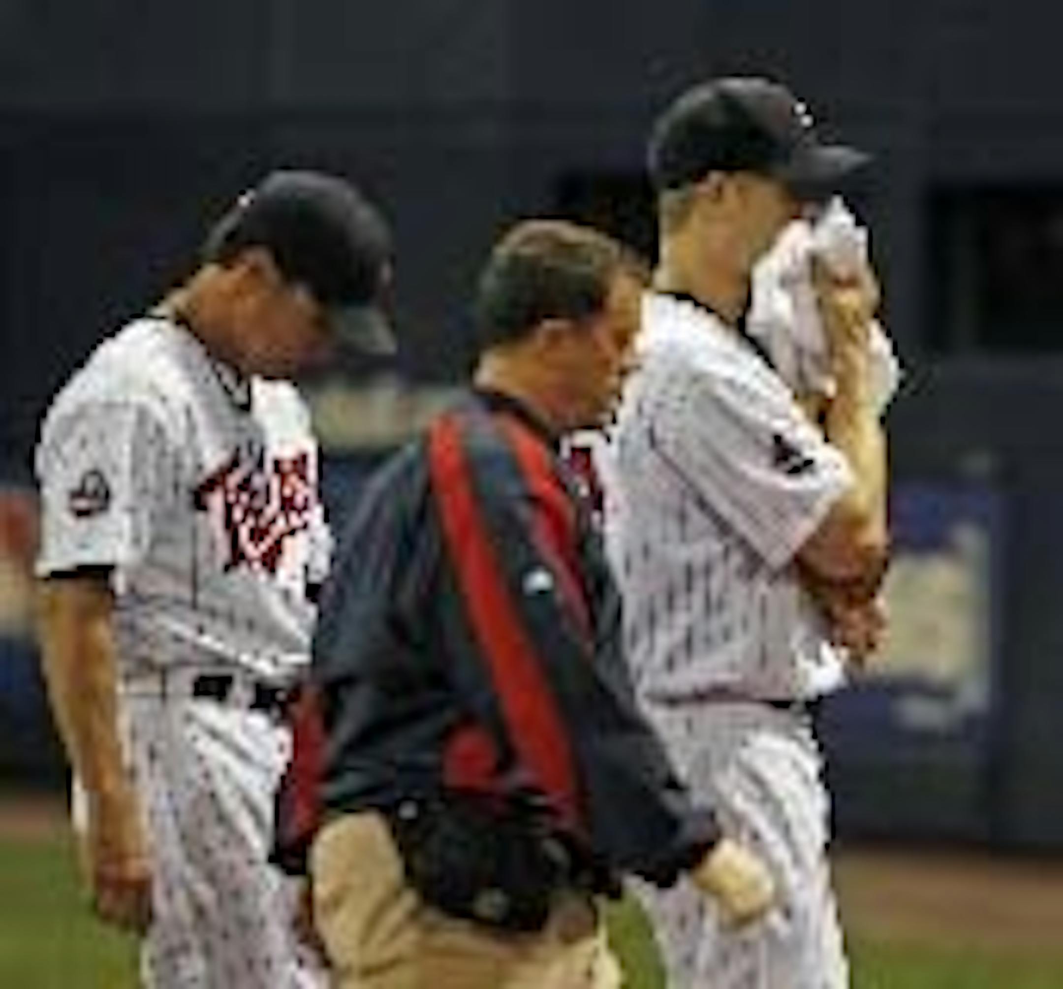 Twins head trainer Rick McWane