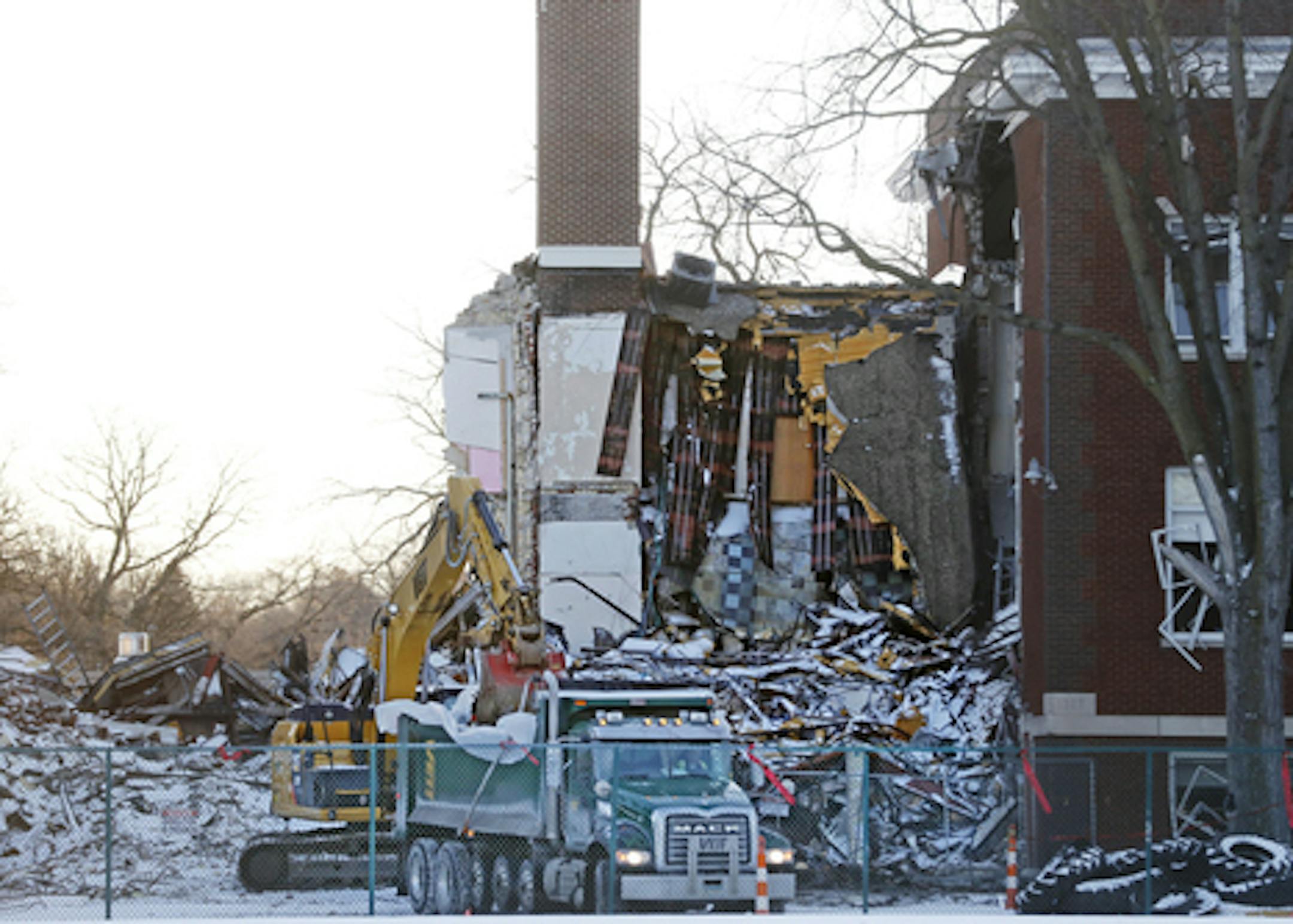 Construction crews begin demolition of the Minnehaha Academy campus damaged by a natural gas explosion. Over the next, two weeks, will be working to remove debris from the site.] Richard Tsong-Taatarii•rtsong-taatarii@startribune.com