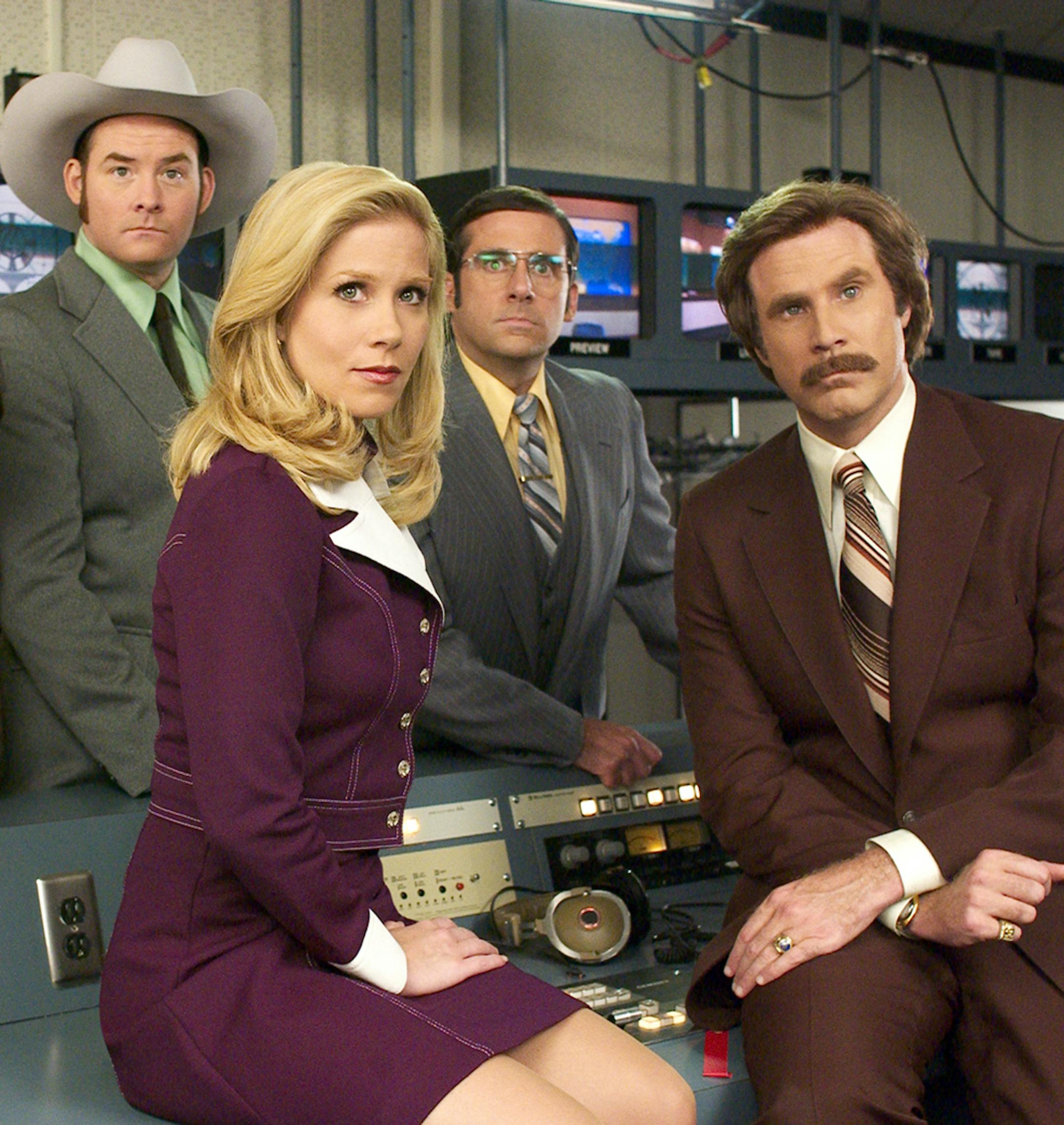 Photo by Darren Michaels... ßVeronica Corningstone (CHRISTINA APPLEGATE, seated center) is the newest addition to the Channel 4 news team, much to the consternation of lead anchor, Ron Burgundy (WILL FERRELL, far right) and his fellow anchor-men, (left to right) Brian Fantana (PAUL RUDD) Champ Kind (DAVID KOECHNER) and Brick Tamland (STEVE CARELL), in DreamWorks PicturesÌ comedy ANCHORMAN: THE LEGEND OF RON BURGUNDY. ORG XMIT: MIN2013031114094739
