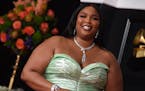 Lizzo arrives at the 63rd annual Grammy Awards at the Los Angeles Convention Center on Sunday, March 14, 2021.