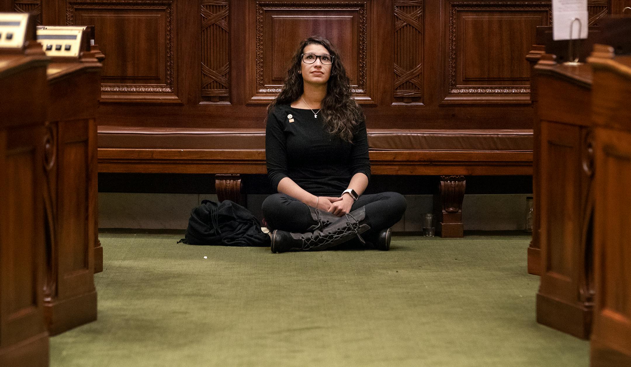 Rep. Erin Maye Quade of Apple Valley a DFL state lawmaker frustrated with the Minnesota Legislature’s inaction on gun control proposals began a 24-hour sit-in on the floor of the state House on Tuesday. ] CARLOS GONZALEZ • cgonzalez@startribune.com – April 25, 2018, St. Paul, MN, Minnesota State Capitol, Rep. Erin Maye Quade of Apple Valley, 24-hour sit-in on the floor of the state House