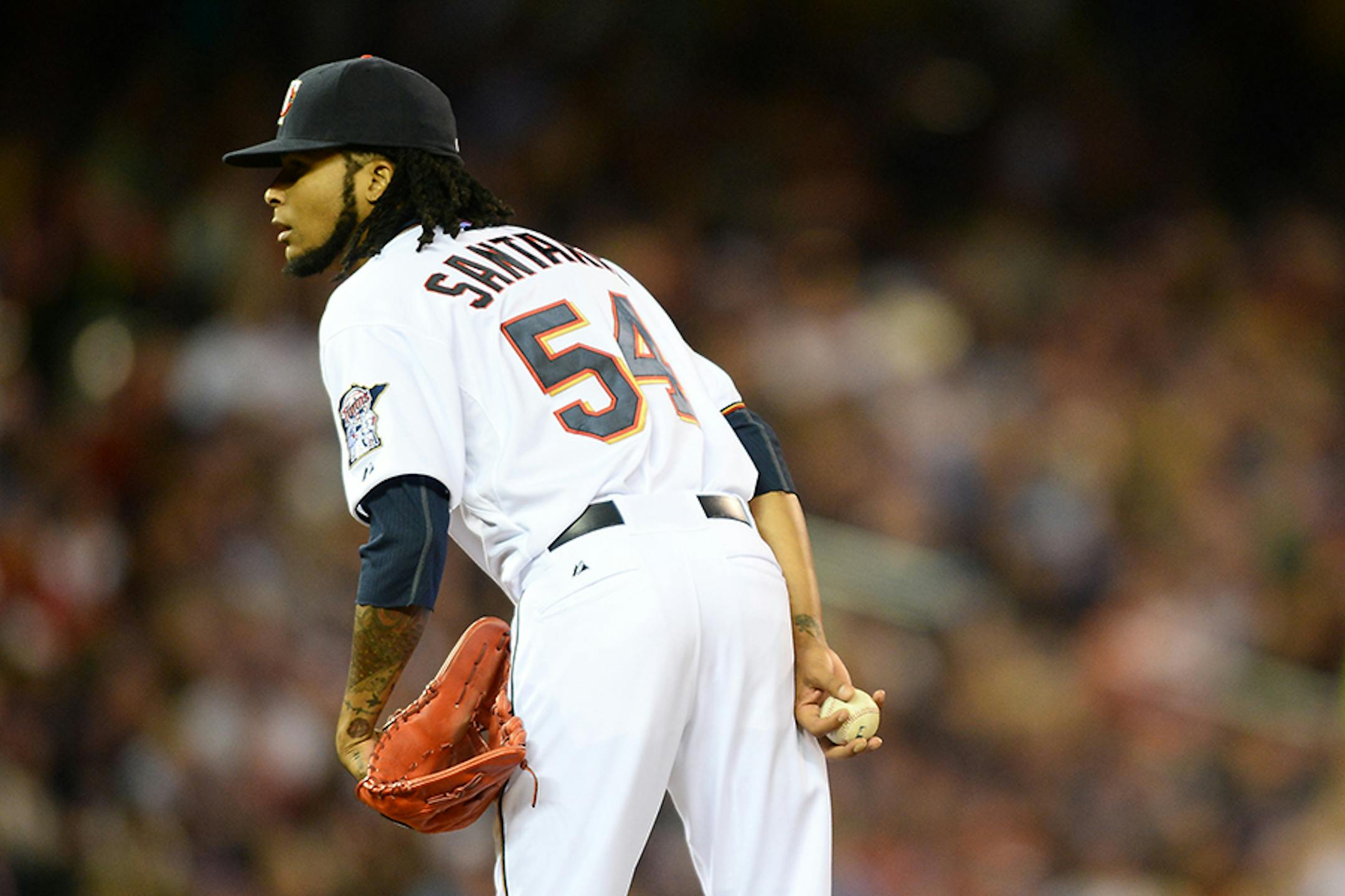 Minnesota Twins starting pitcher Ervin Santana (54) set up for a pitch against Kansas City in the top of the second inning Friday.