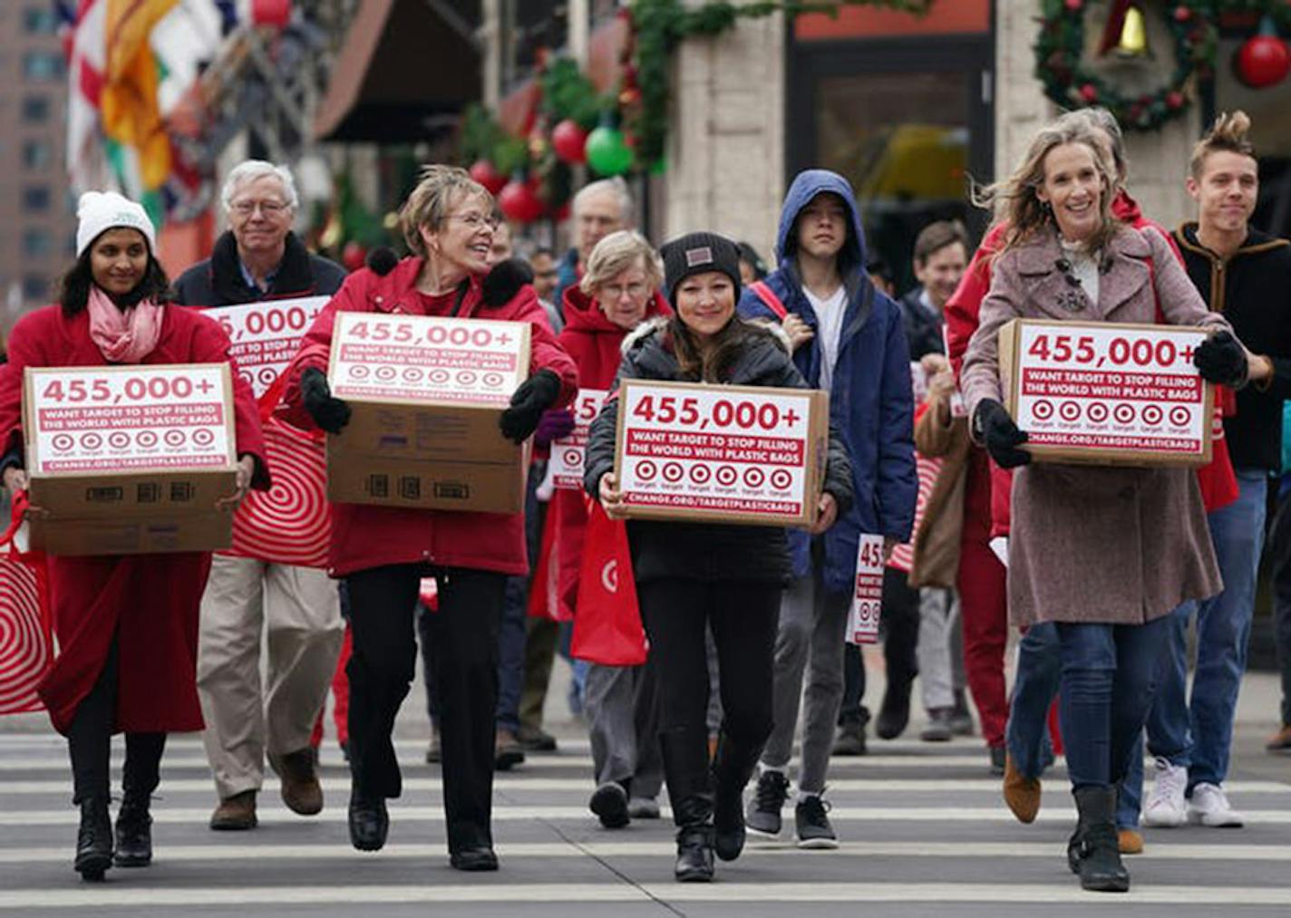 Theresa Carter, right, who started a petition on Change.org calling for the retail giant Target to end its use of plastic bags, along with supporters delivered her petitions in Minneapolis on Thursday, Dec. 26, 2019. (Anthony Souffle/Star Tribune/TNS) ORG XMIT: 1525789