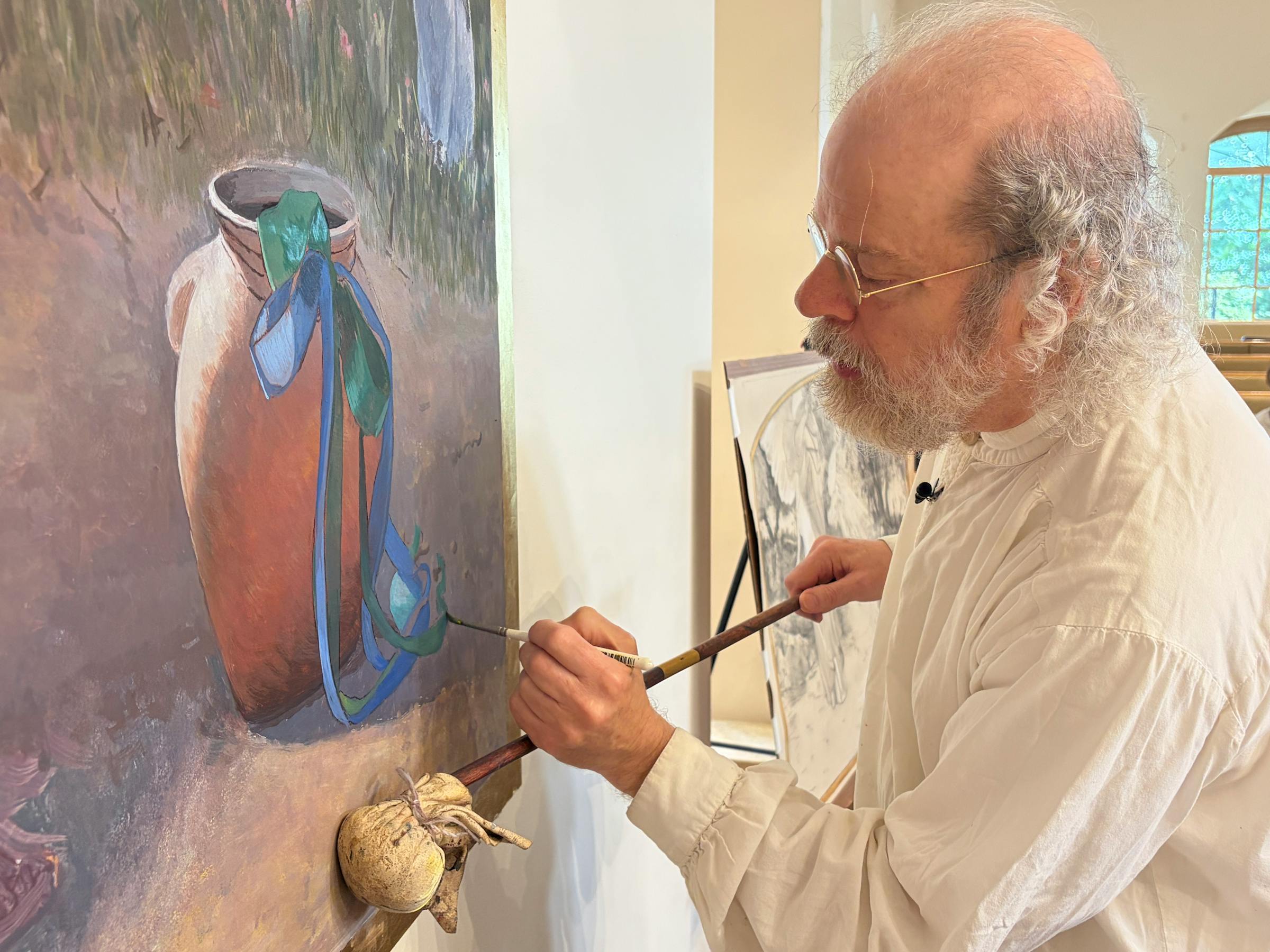 Artist paints commemorative Annunciation Church ribbons into fresco
