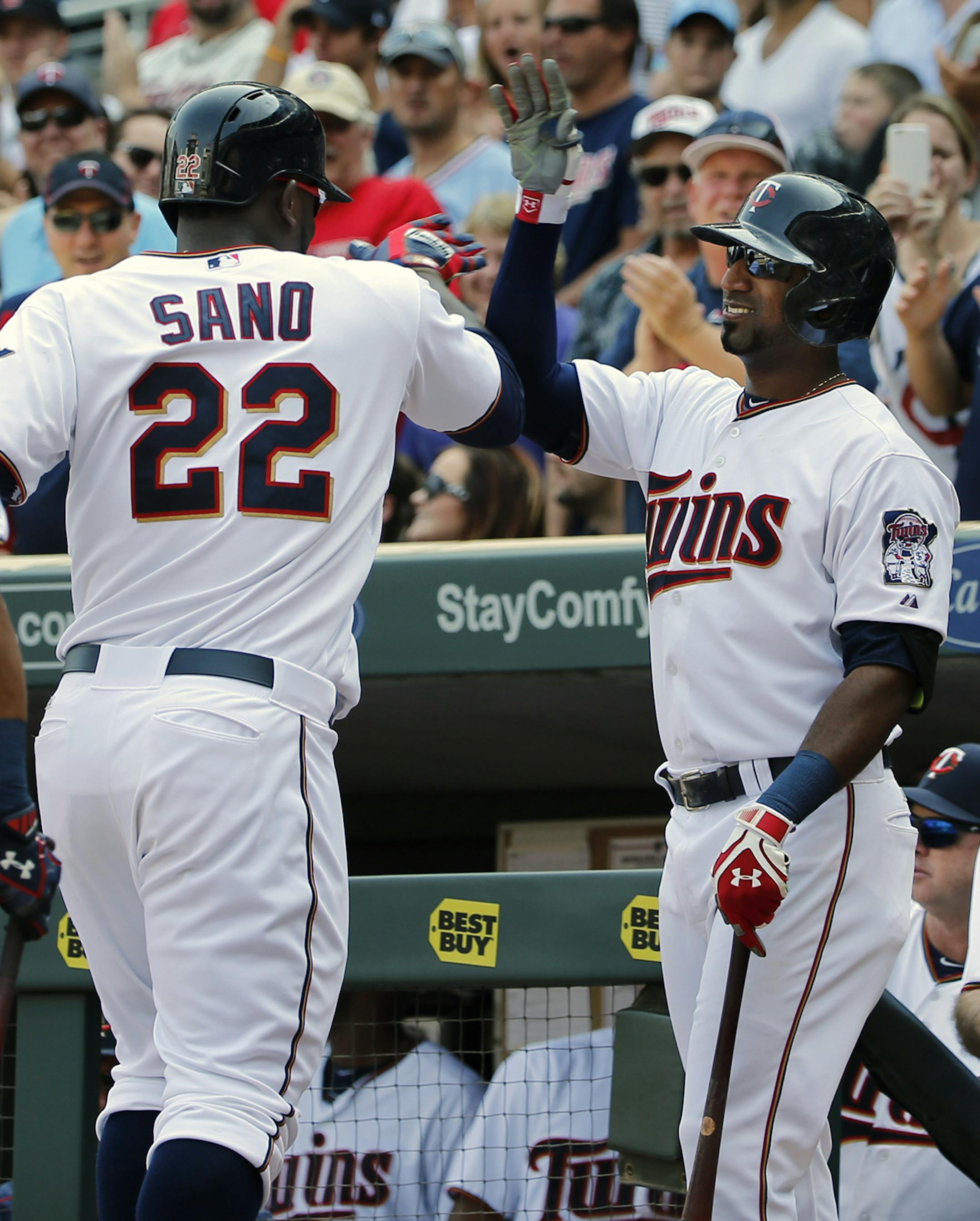 Miguel Sano(22) homers in the7th inning, scoring two runs as he is congratulated by his teammates in the dugout.] At the Twins vs Astros game at Target Field on 8/30/2015Richard Tsong-Taatarii/rtsong-taatarii@startribune.com