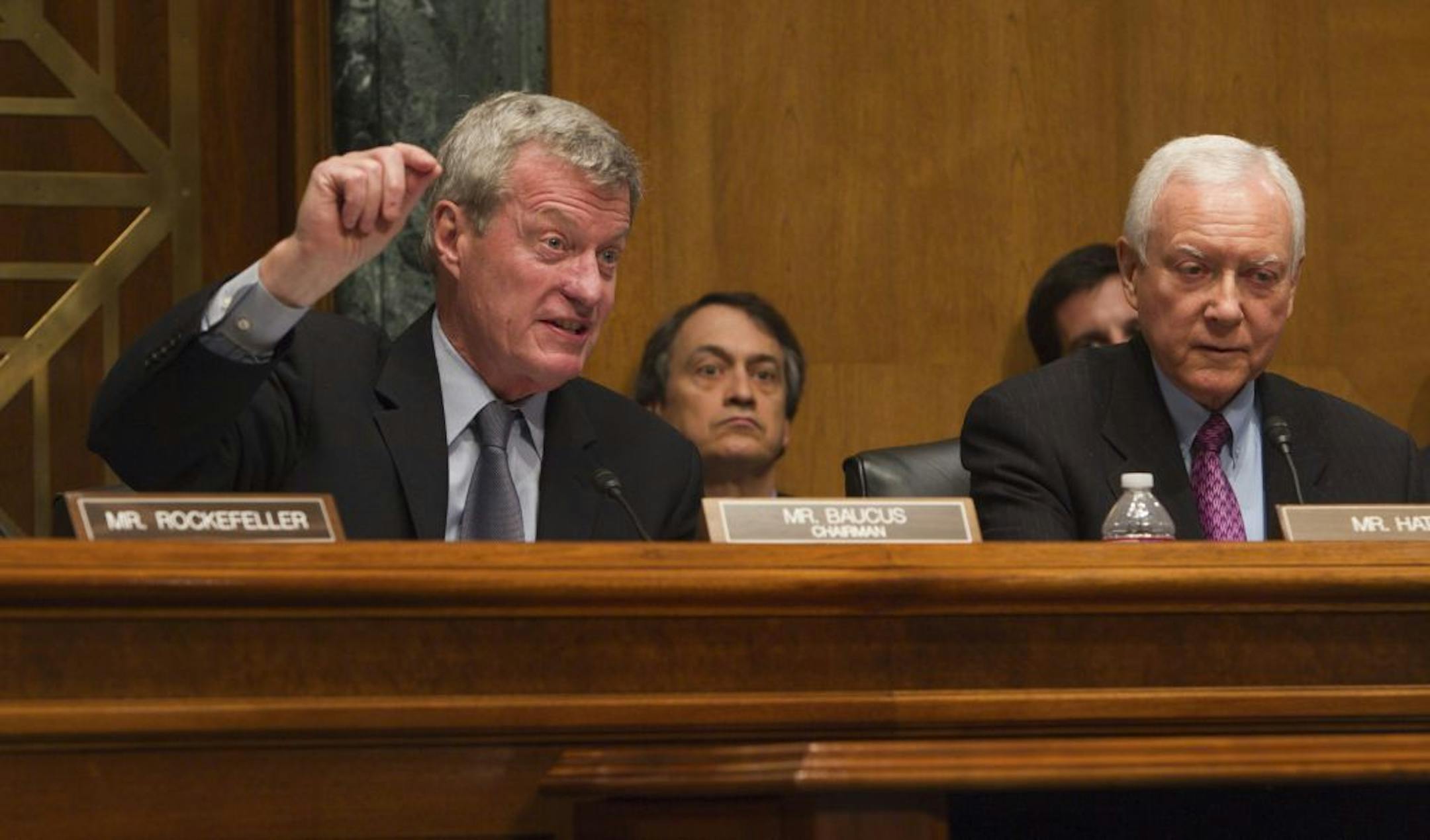 FILE-- Sens. Max Baucus, left, (D- Mont.) and Orrin Hatch (R-Utah) during a Senate Finance Committee hearing on oil company subsidies on Capitol Hill in Washington, on May 12, 2011. Baucus, chairman of the powerful Finance Committee, will retire from the Senate after 36 years, the sixth Senate Democrat to head to the exits in 2014, according to Democratic officials close to the senator on April, 23, 2013.