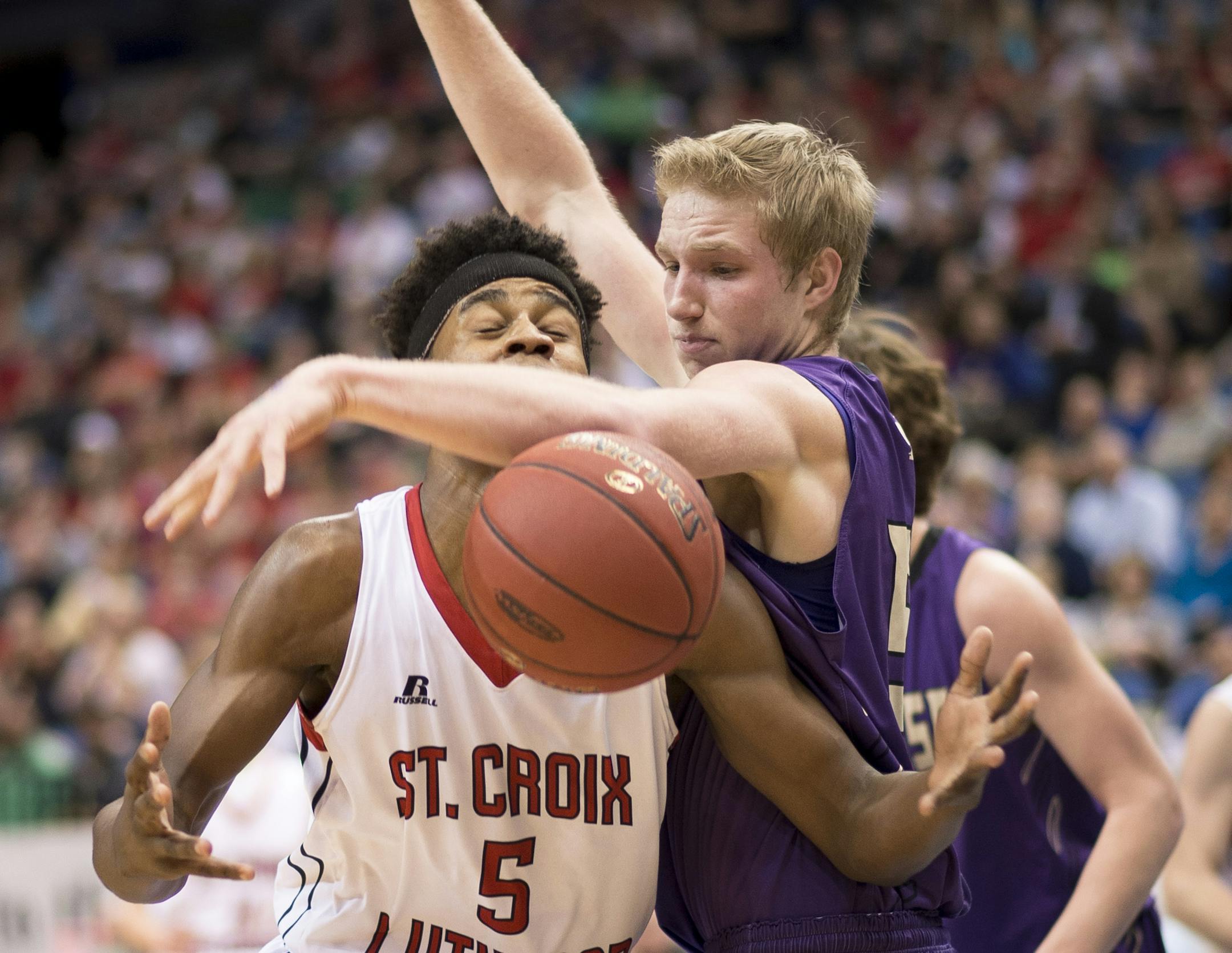 Melrose forward Blake Gerads (55) knocks the ball loose from the hands of St. Croix Lutheran guard Ade Lamu (5) during the first half. ] (Aaron Lavinsky | StarTribune) Melrose plays St. Croix Lutheran in the Class 2A boys' basketball semifinals on Friday, March 13, 2015 at Target center.