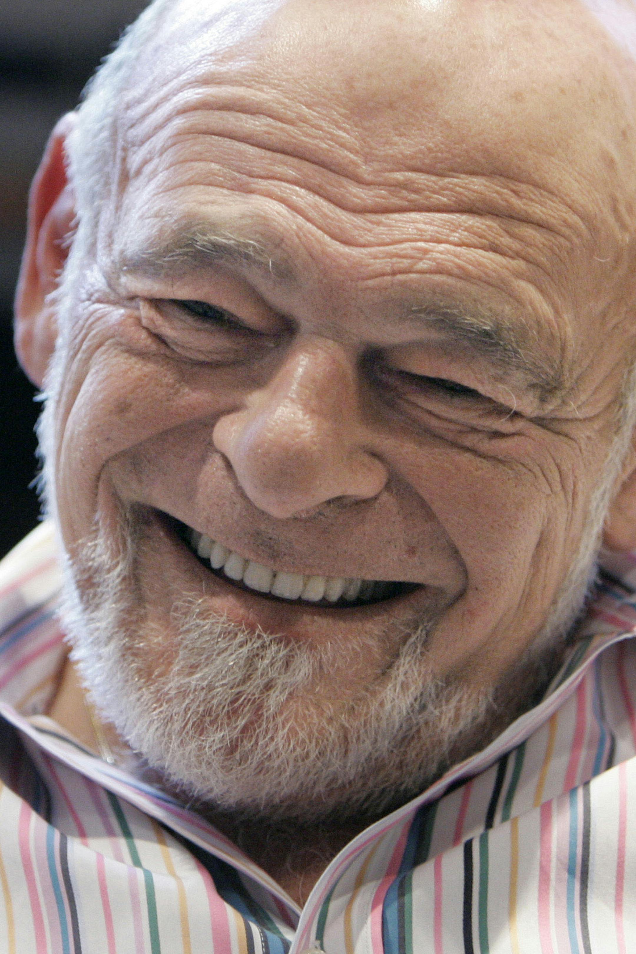 **FILE** Billionaire real estate investor Sam Zell smiles during an interview in Chicago in this March 20, 2007 file photo. Tribune Co. has accepted a buyout offer from real estate investor Sam Zell in a deal valued at about $8.2 billion, the media company said Monday, April 2, 2007. Tribune said Zell plans to invest $315 million in the deal and the company will sell the Chicago Cubs baseball team at the end of this season. (AP Photo/M. Spencer Green, file) ORG XMIT: CX108
