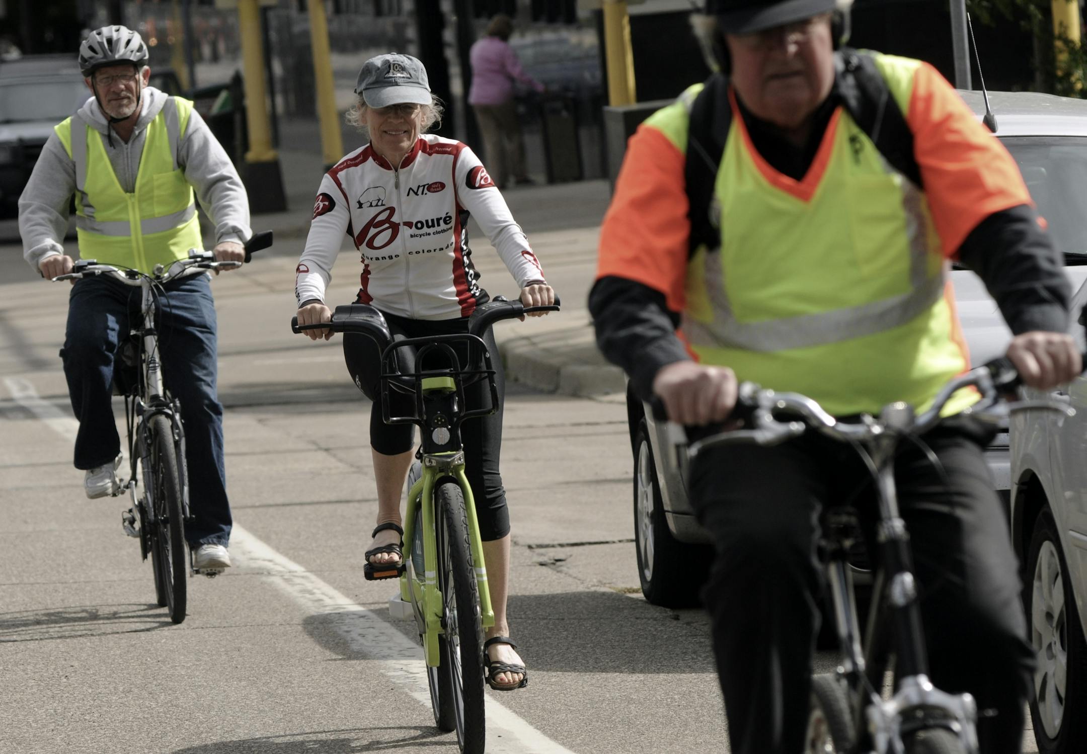 The Bike Walk to Work Day celebration was held this morning at Hennepin County Government Center Plaza . These three riders were on a social ride along Portland Ave. they are from left to right Dave Dahl, of Minneapolis, Barbara Dahl of Durango Co and Shar Feldheim of Minneapolis.