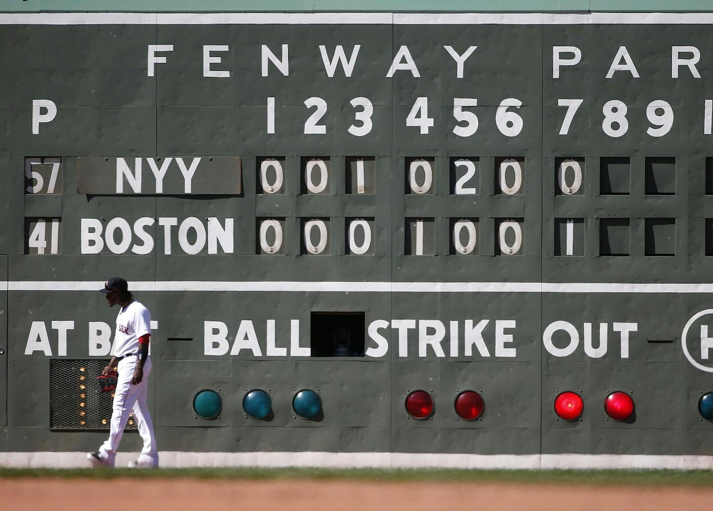 Boston Red Sox's Hanley Ramirez stands in front of the scoreboard during the eighth inning of a baseball game against the New York Yankees in Boston, Saturday, May 2, 2015. (AP Photo/Michael Dwyer) ORG XMIT: MIN2015052516274219