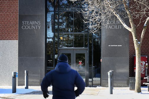 People enter the Stearns County Court Facility in St. Cloud, Minn. on Monday, January 12, 2015. ] LEILA NAVIDI leila.navidi@startribune.com / BACKGROUND INFORMATION: Jury selection began in the trial of Brian Fitch on Monday, January 12, 2015, who is charged with first-degree murder and three counts of attempted first-degree murder in the July 30 death of Mendota Heights police officer Scott Patrick.