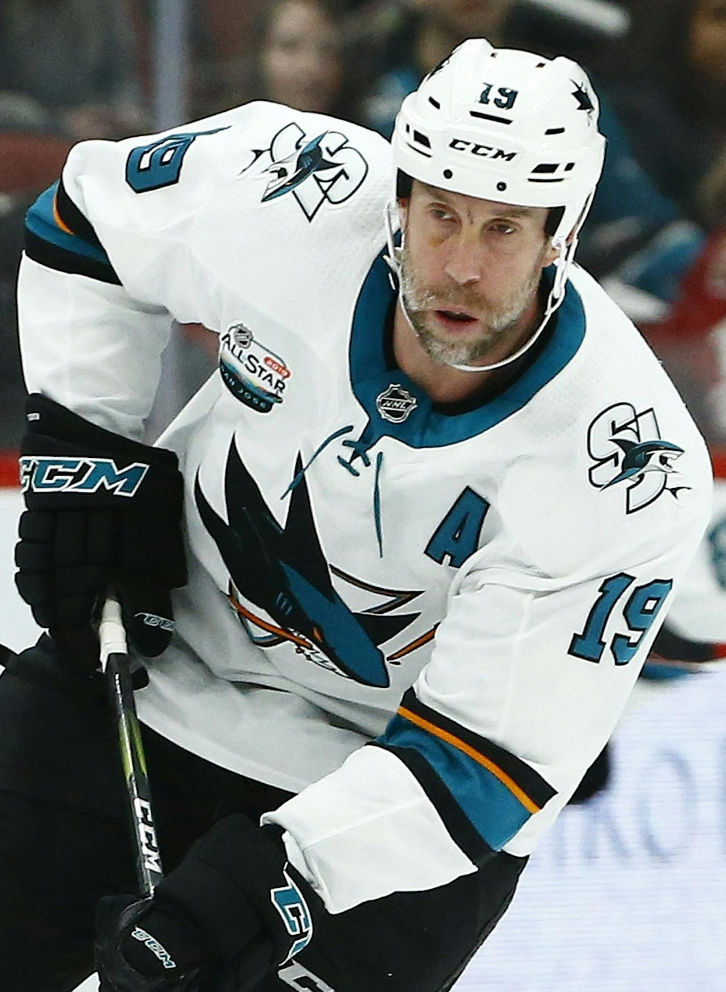 San Jose Sharks center Joe Thornton (19) skates with the puck against the Arizona Coyotes during the first period of an NHL hockey game Saturday, Dec. 8, 2018, in Phoenix. (AP Photo/Ross D. Franklin)