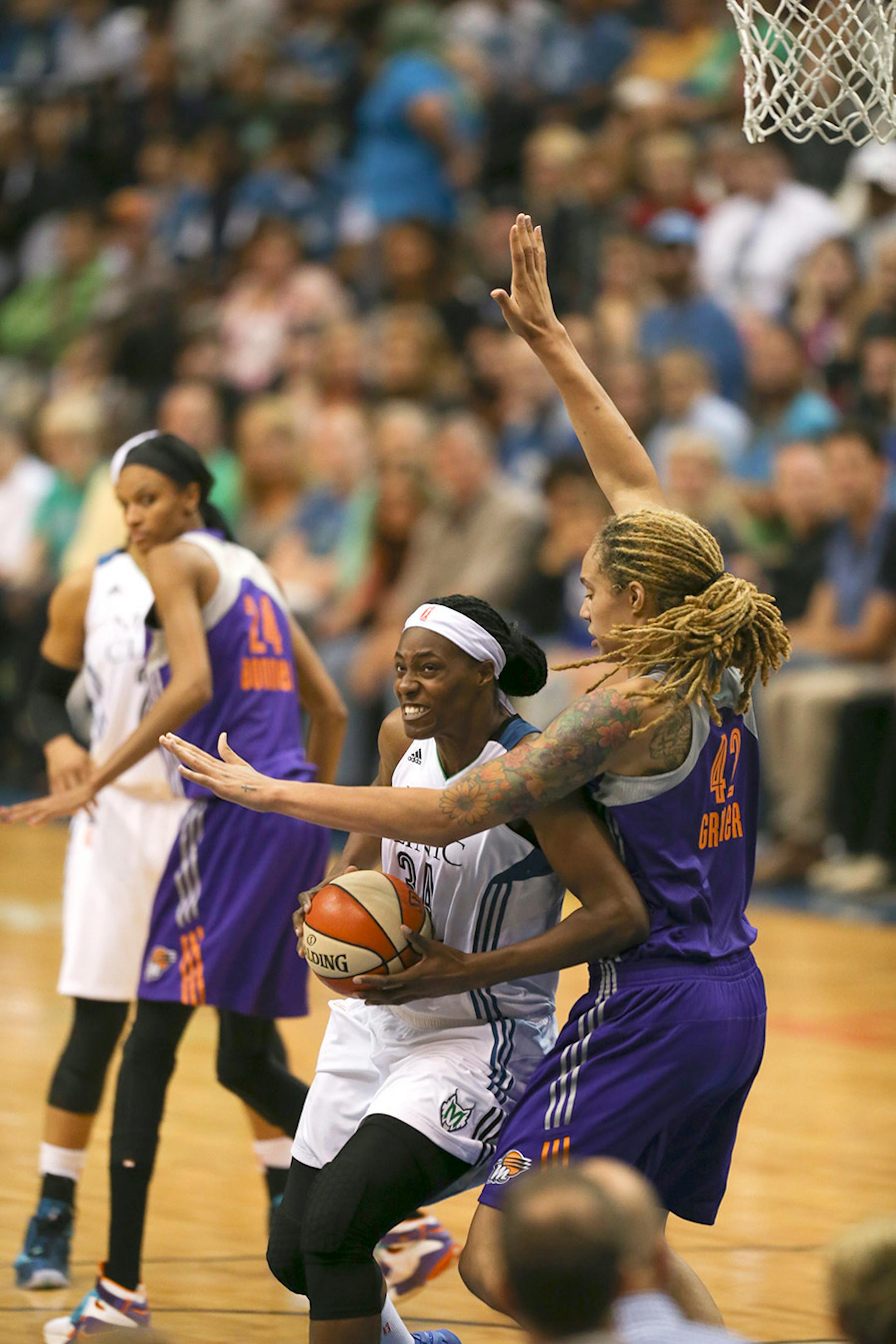 Lynx center Sylvia Fowles (34) went up for a fourth quarter shot while guarded by Phoenix Mercury center Brittney Griner (42) Thursday night at Target Center.