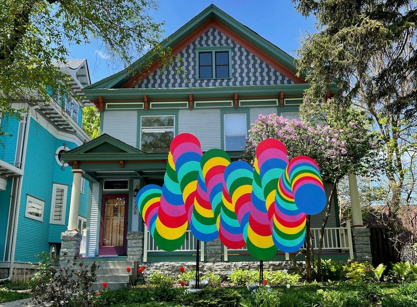 A sculpture based on 'Chromie Squiggle,' an NFT created with generative code, stands on the front lawn of the Porch Gallery at 3306 Park Av. S. in Minneapolis.