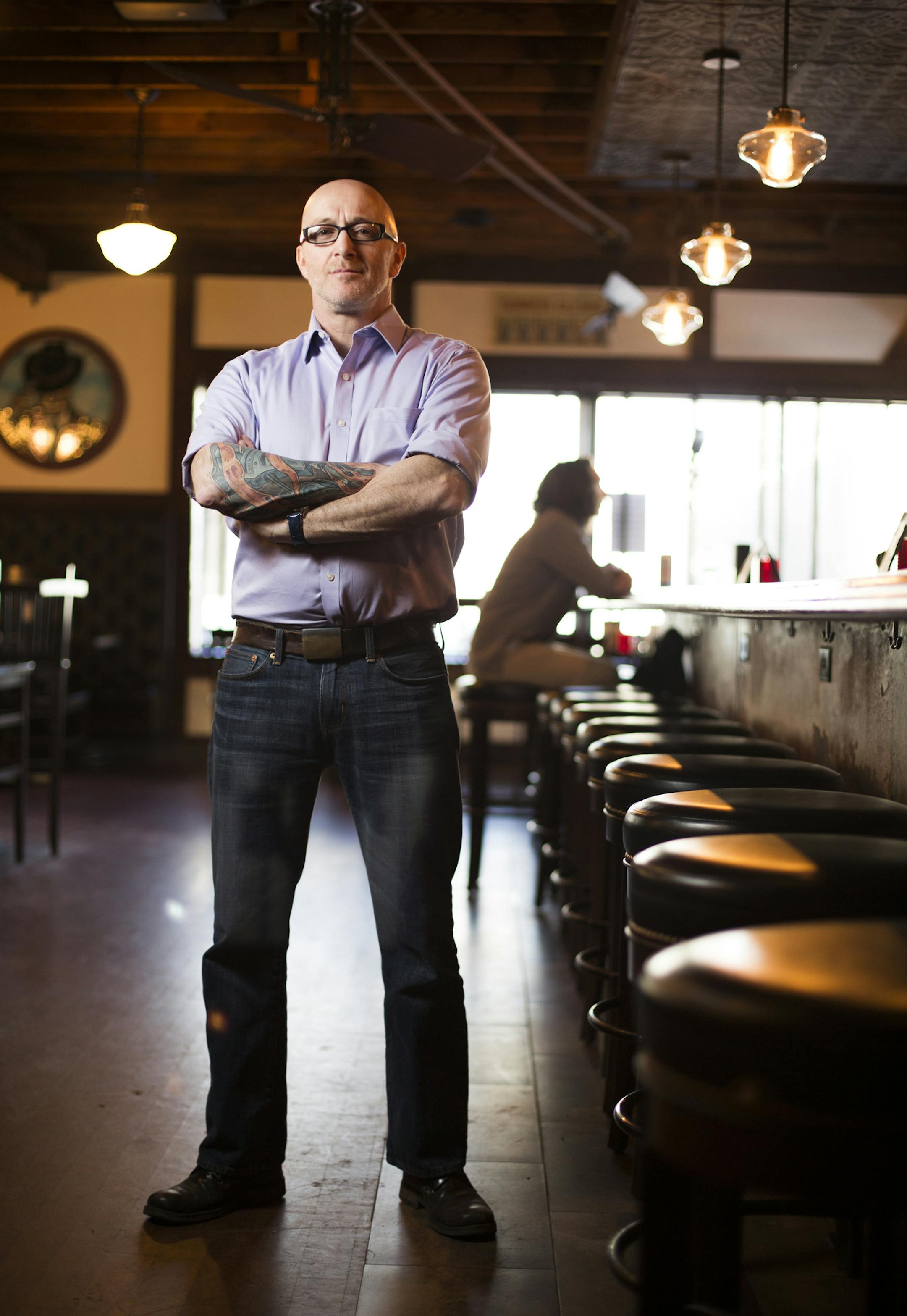 Paul Crilly the co-owner of Morrissey's Irish Pub poses at his bar in Minneapolis on Thursday, March 6, 2015. ] LEILA NAVIDI leila.navidi@startribune.com /