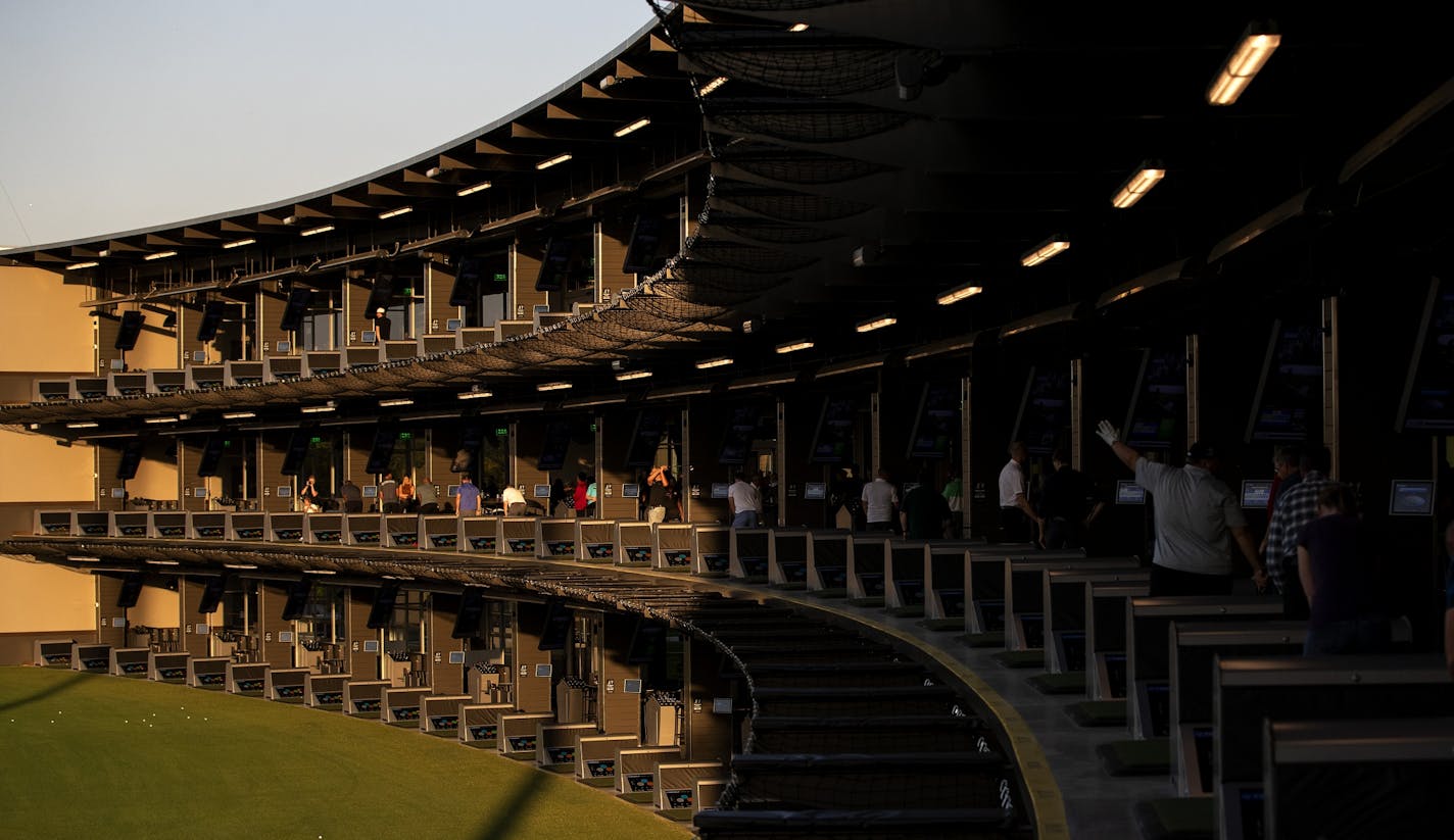 Three driving decks of the new TopGolf in Brooklyn Center.