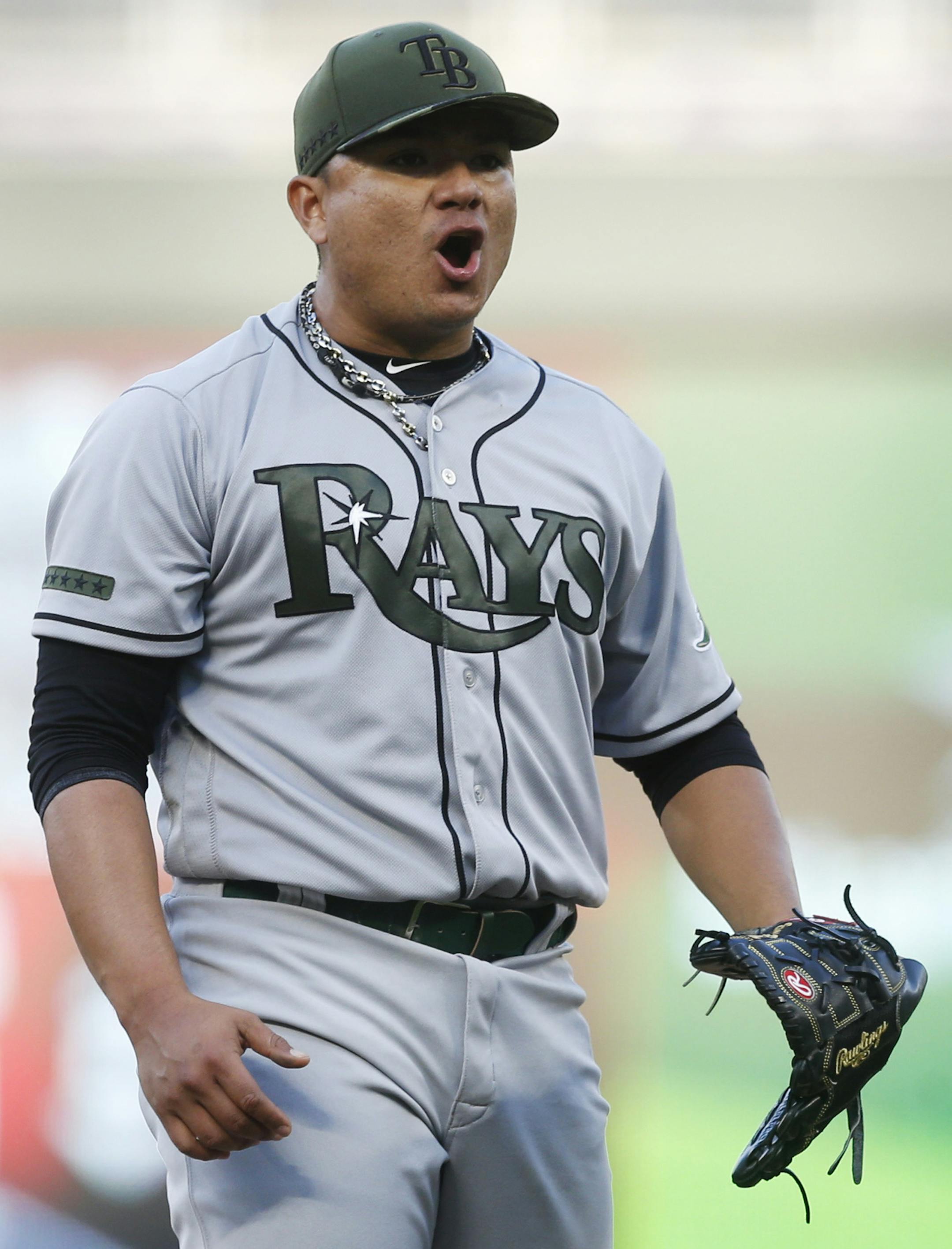 Tampa Bay Rays relief pitcher Erasmo Ramirez celebrates the final out as the Rays beat the Minnesota Twins 8-6 in 15 innings of a baseball game Sunday, May 28, 2017 in Minneapolis. Ramirez got the save. (AP Photo/Jim Mone)
